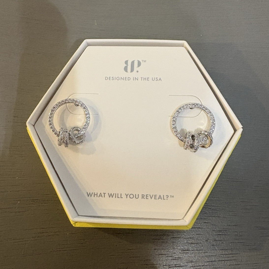 ER76842 We’re Here For It Diamond Cubic Zirconia Materials: Rhodium Plating