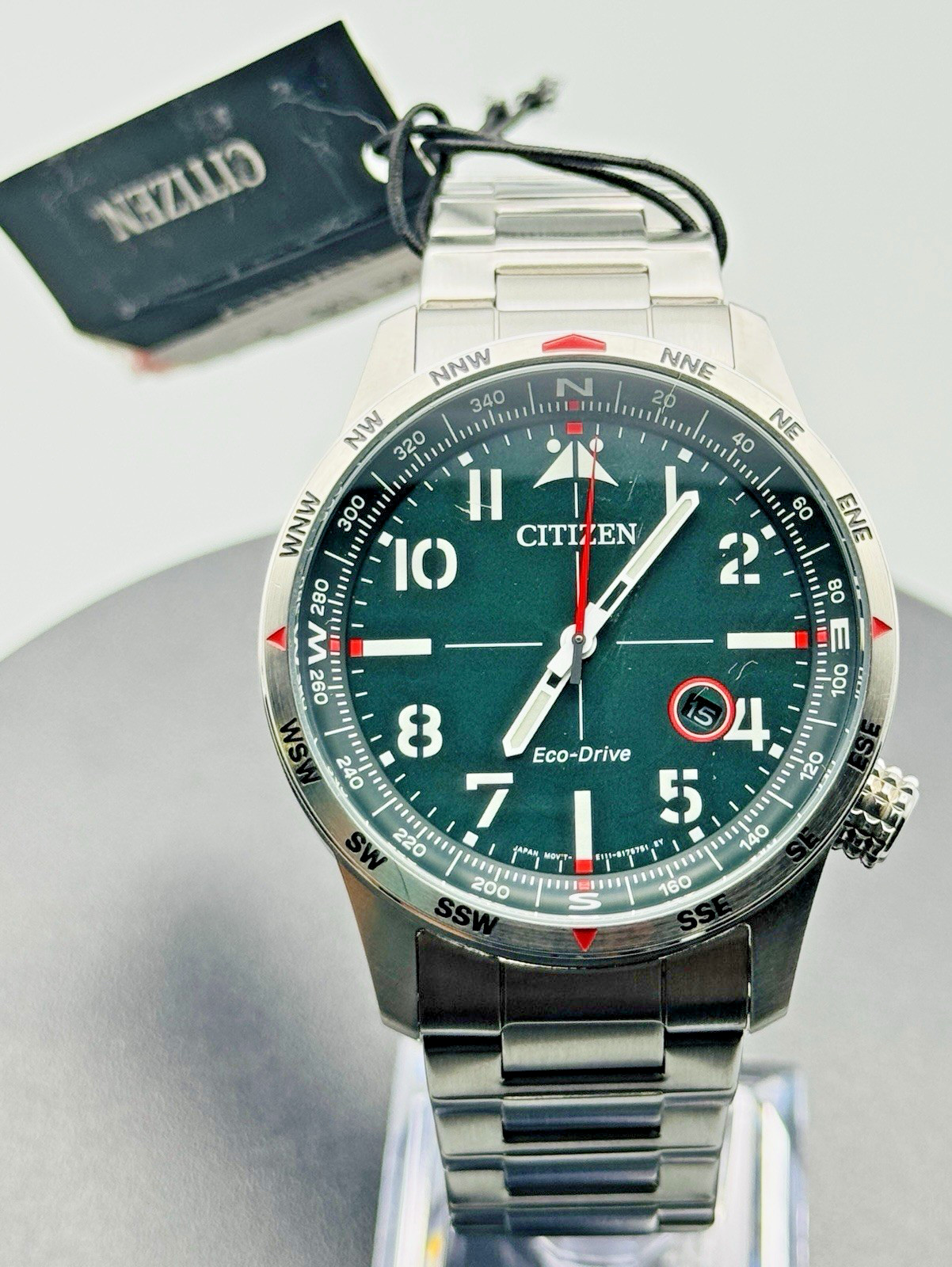 Citizen Eco-Drive Weekender Sport Watch Green Dial Compass Bezel Stainless Steel