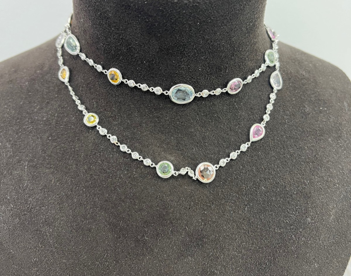 An Elegant White Gold Blue Sapphire and Diamond By-the-Yard Necklace