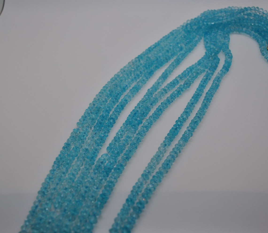 blue topaz (coloured) gemstone strand with faceted stones (no clasp)
