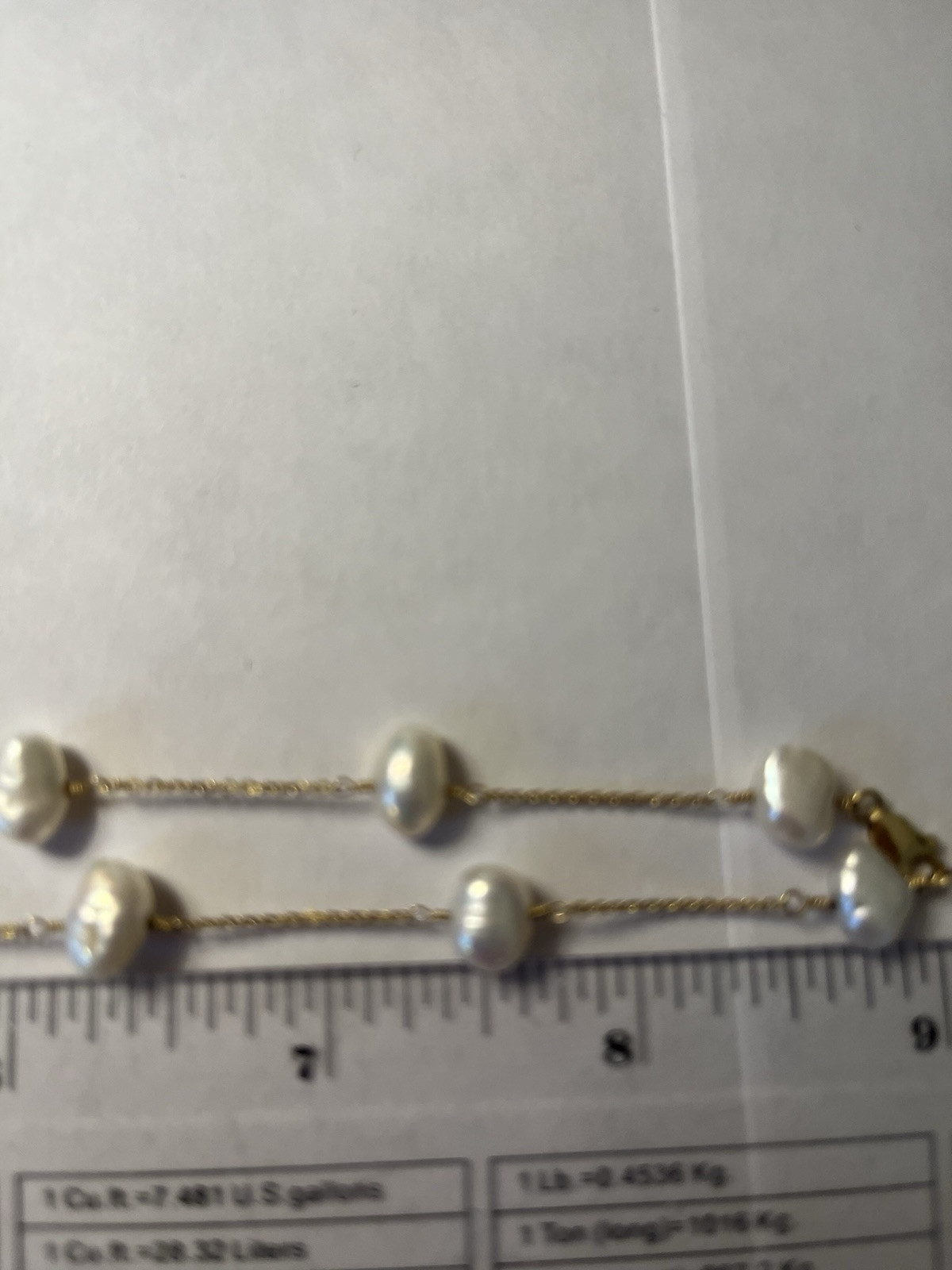 Stunning 14K gold 18″ pearl station necklace heavy 8.8 Grams.