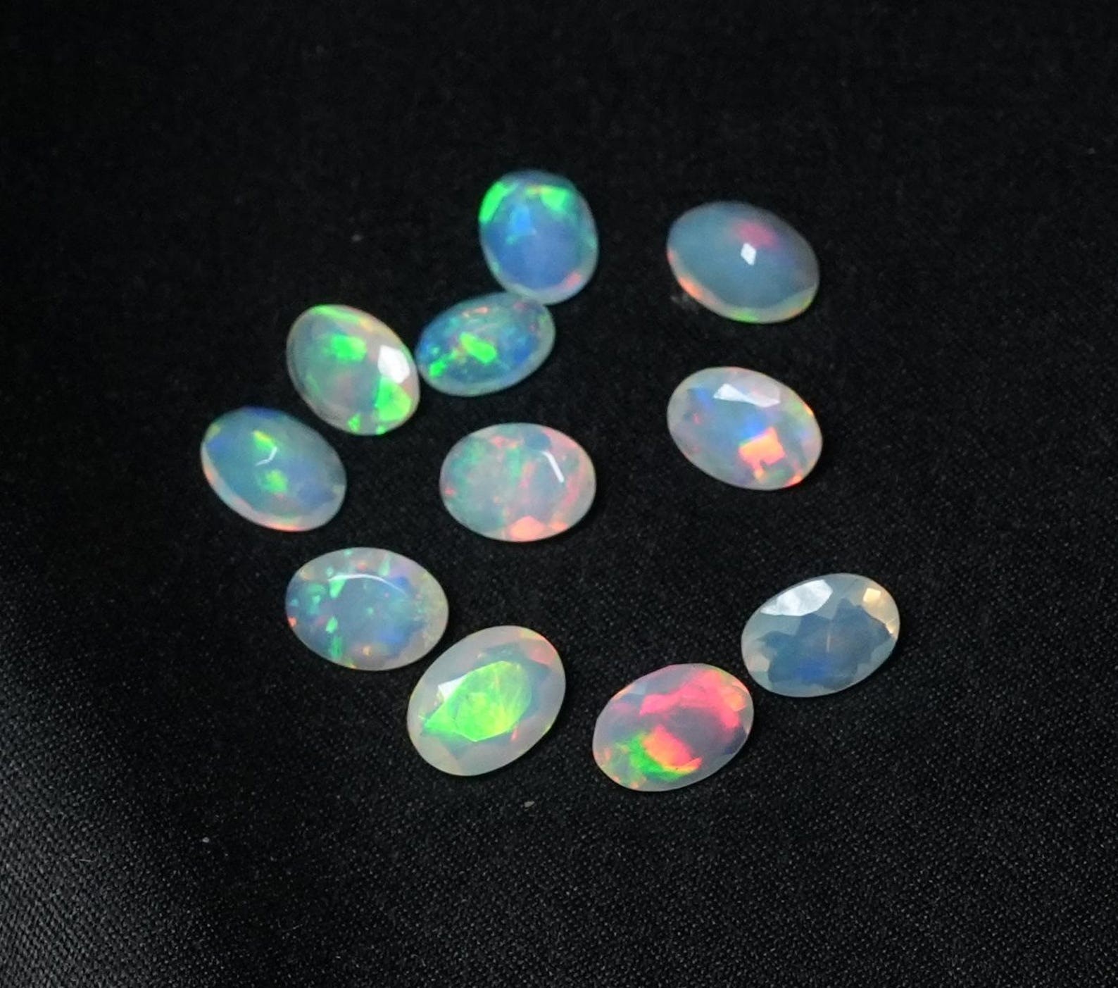 Natural Rainbow Ethopian Opal Oval Faceted Cut 3x5mm To 8x10mm Loose Gemstone