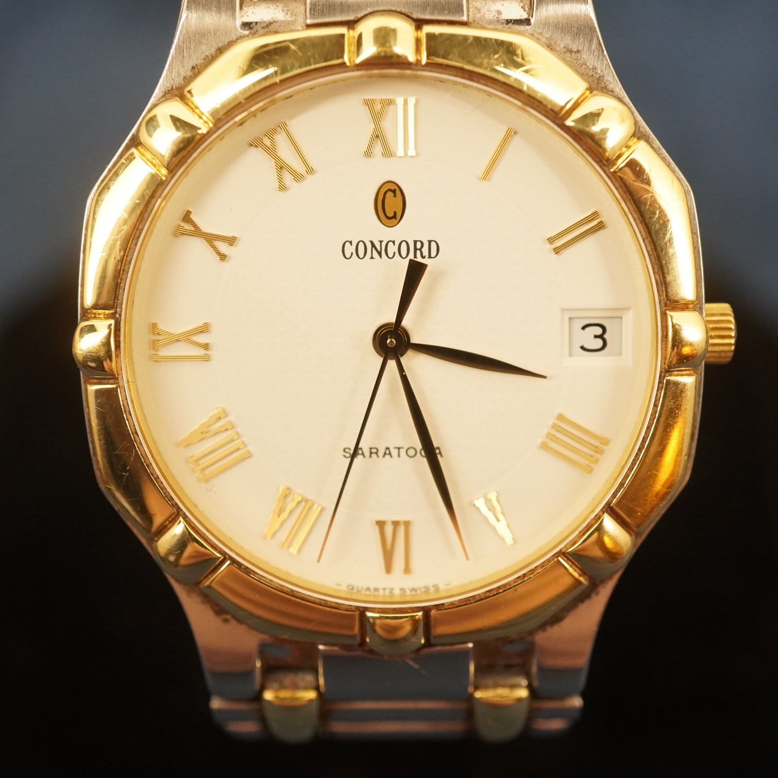 Concord Saratoga Men’s Two-Tone Silver Roman Dial w 18kt Gold Bezel Watch
