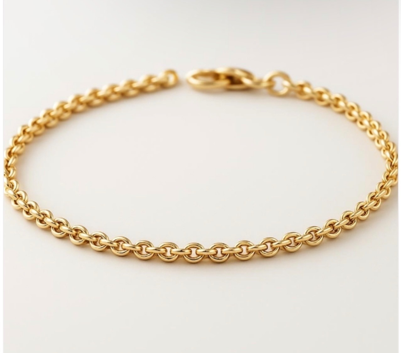 7 INCHES 10K GOLD: 1.15MM GOLD OVAL TRACE BRACELET
