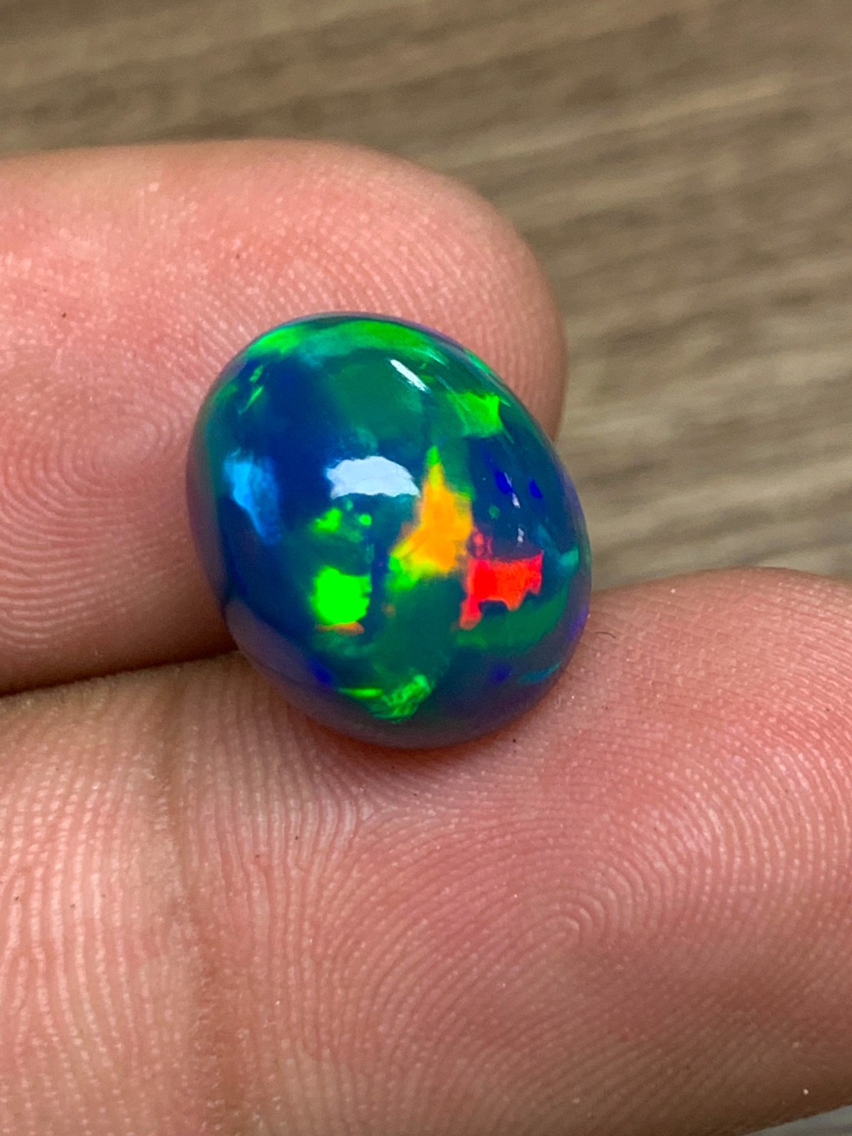 Ethiopian Opal Gemstone 6.35crt Black Oval Cabochon Rainbow Flash Welo Loose Gem
