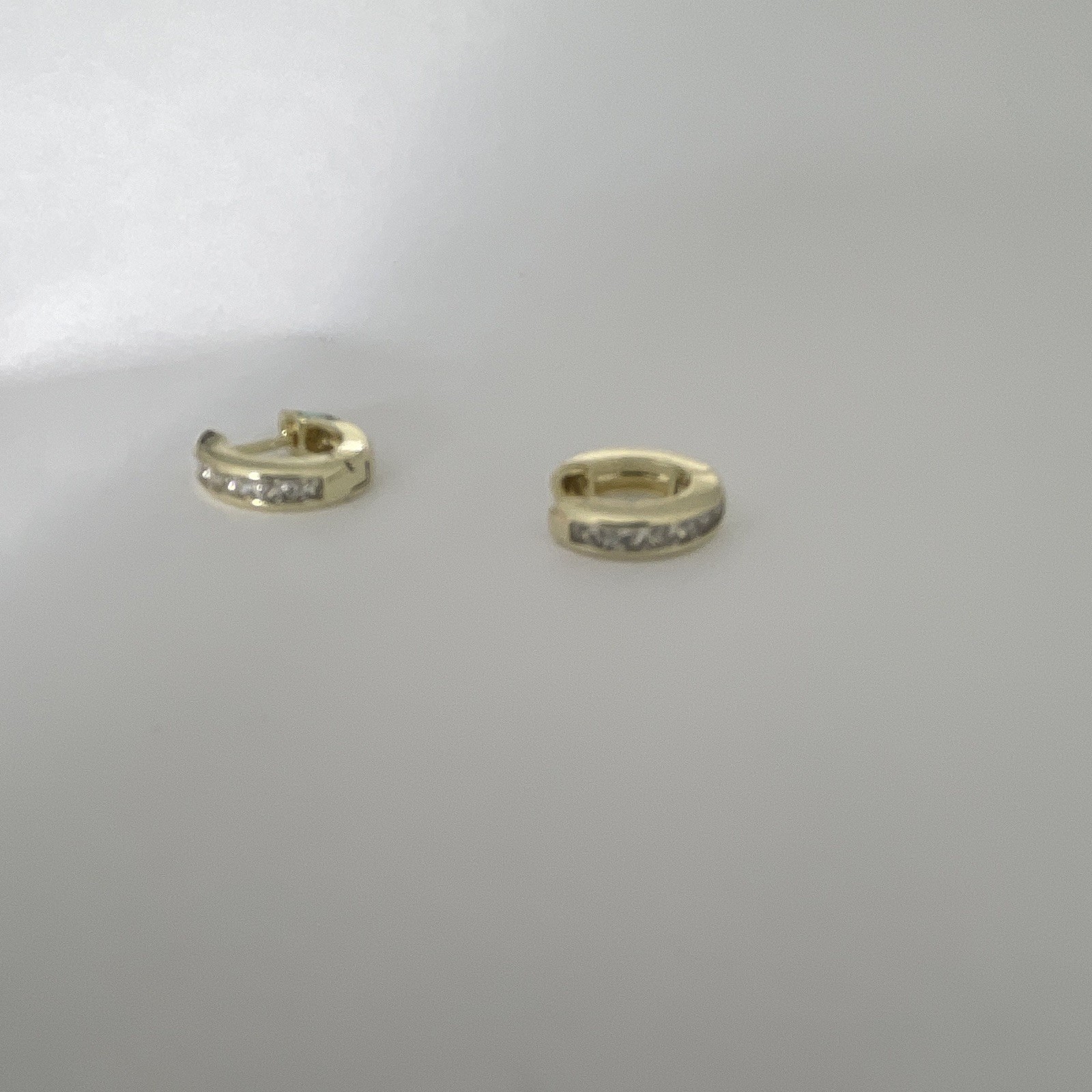 Gold Tone Huggie Hoop Earrings Round White Cubic Zirconia Pavé Hinged