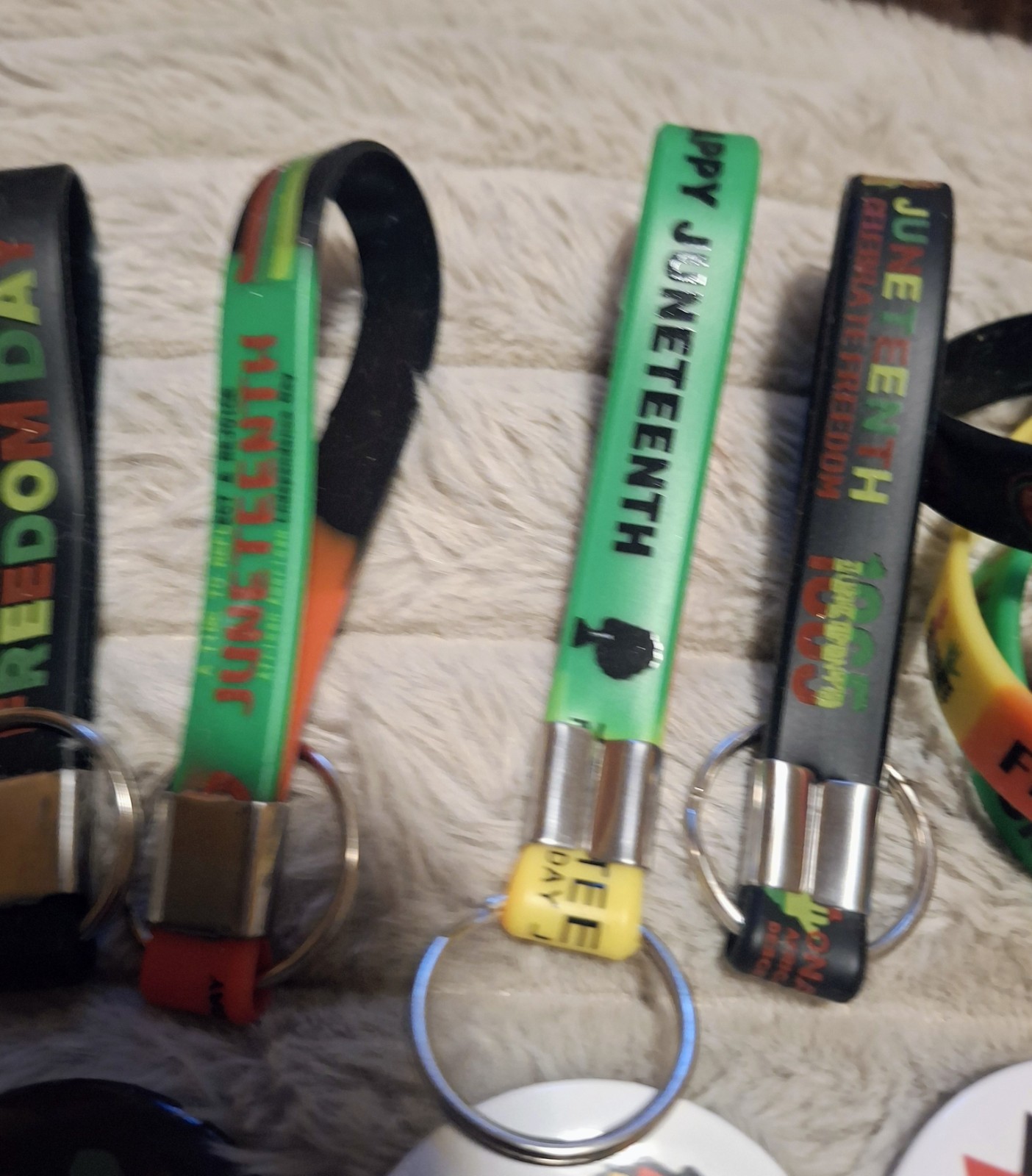 Juneteenth Celebration – Pins, Bracelet and Key Rings. 12 Items.