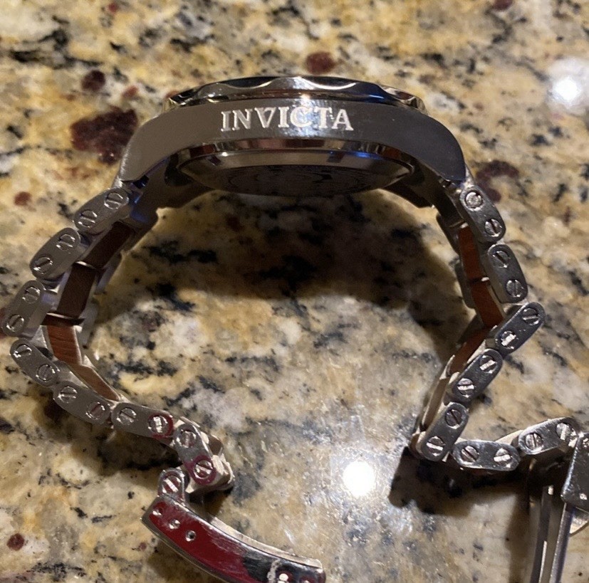 Invicta Pro Diver men’s quartz watch with a wood grain dial model 0164.
