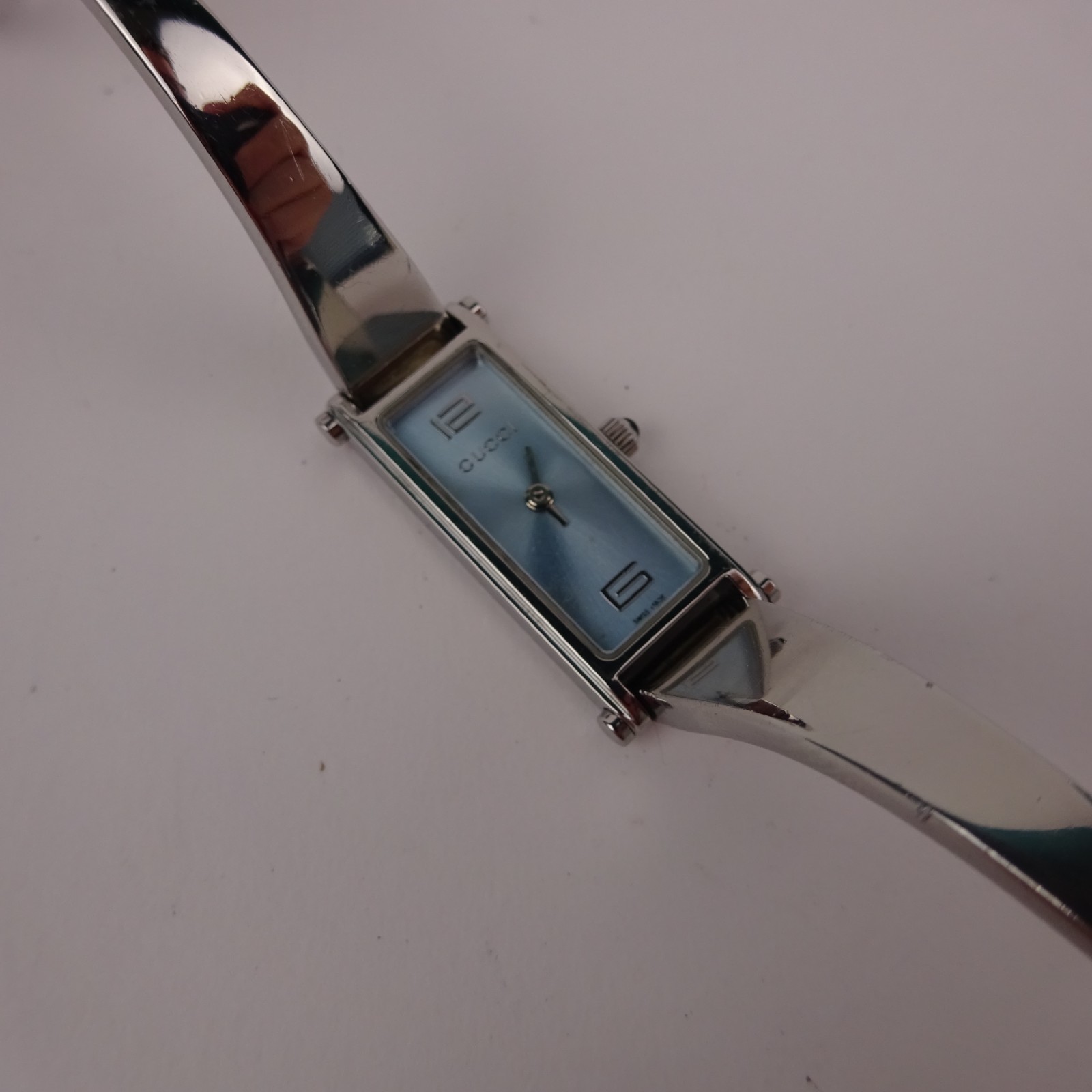 Gucci 1500L Bangle Watch Baby Blue Dial Stainless Steel Women’s