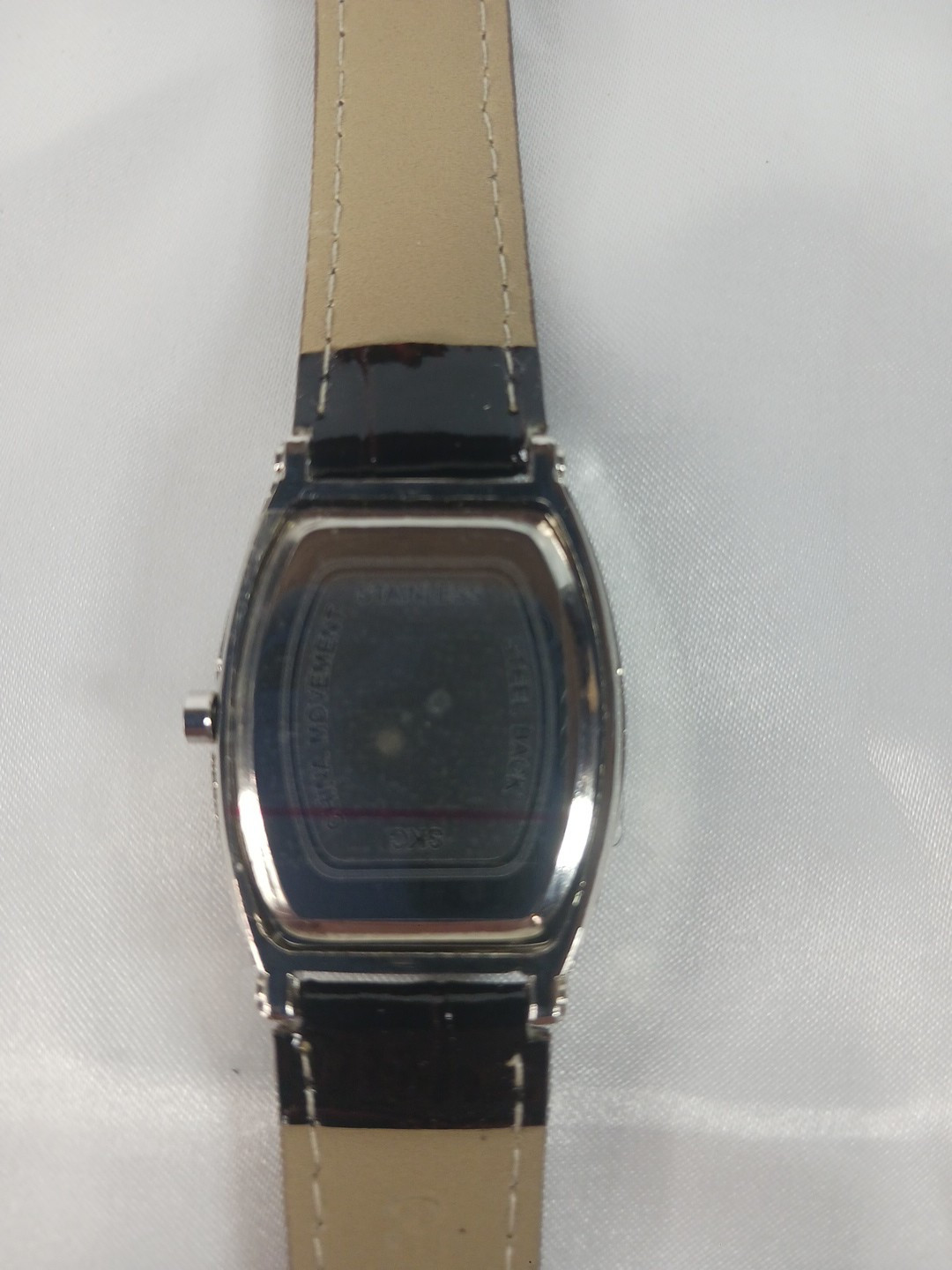 New Quartz watch. Tonneau / Barrel Case Shape. Roman Numerals