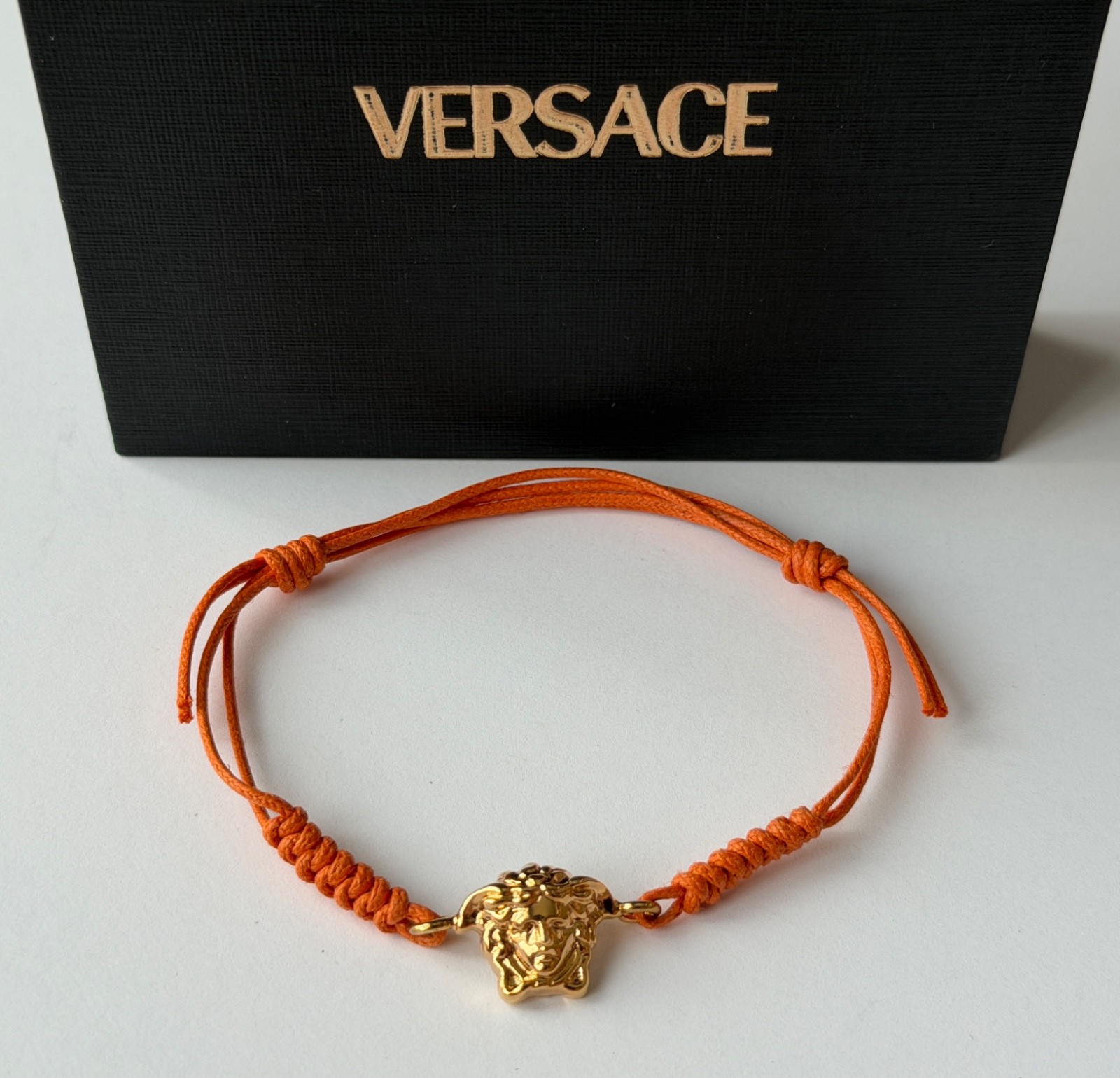 NWT Versace Medusa Head 3D Logo Charm Gold Orange Drawstring Cord Bracelet $495