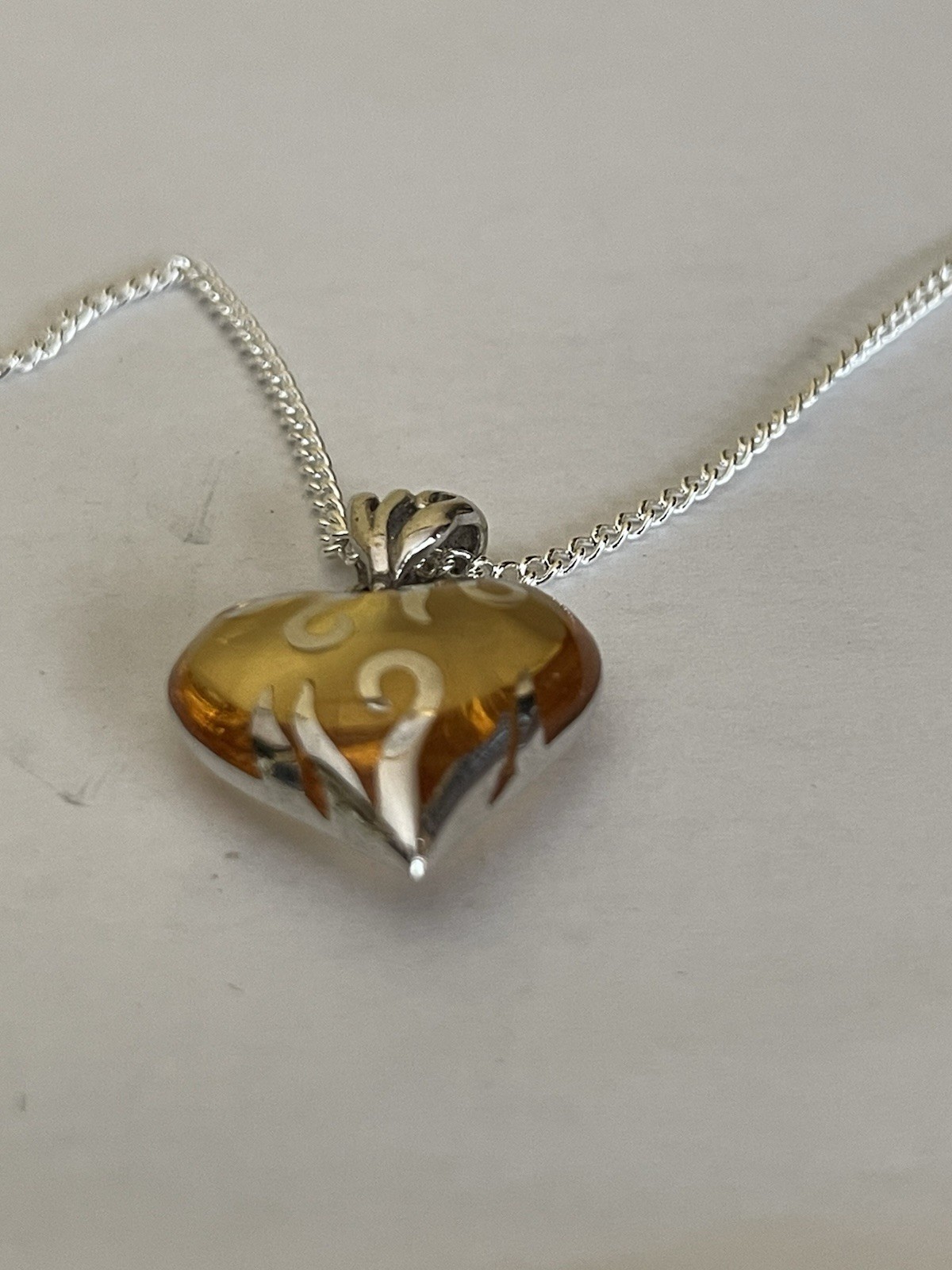 Sterling Silver Amber Heart Pendant On 46cm Length Chain