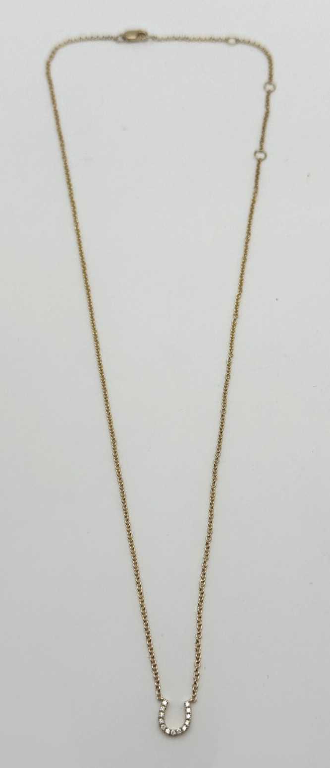14k Gold 18″ Necklace, Horseshoe center piece set with 0.08cts of Diamonds 2g