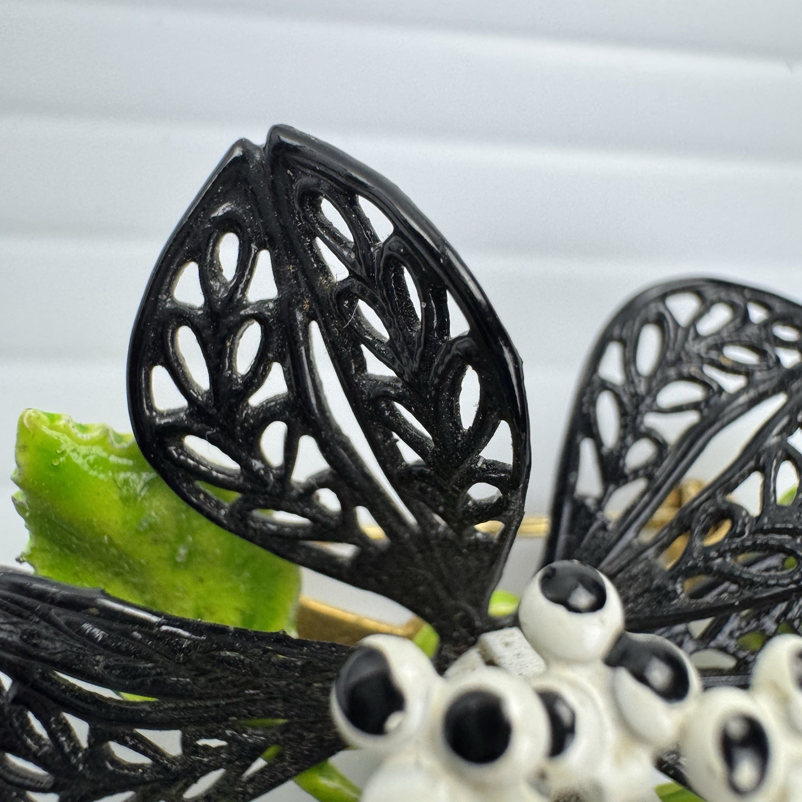 Vintage Enamel Flower Brooch Black White Green Filigree Leaf Statement Pin