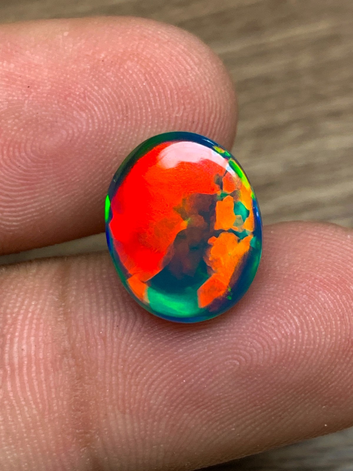 Ethiopian Opal Gemstone 6.35crt Black Oval Cabochon Rainbow Flash Welo Loose Gem