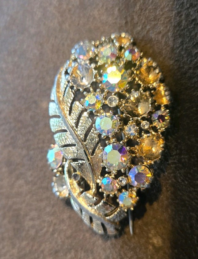 Vintage gold-tone statement brooch from the mid-20th century, costume jewelry