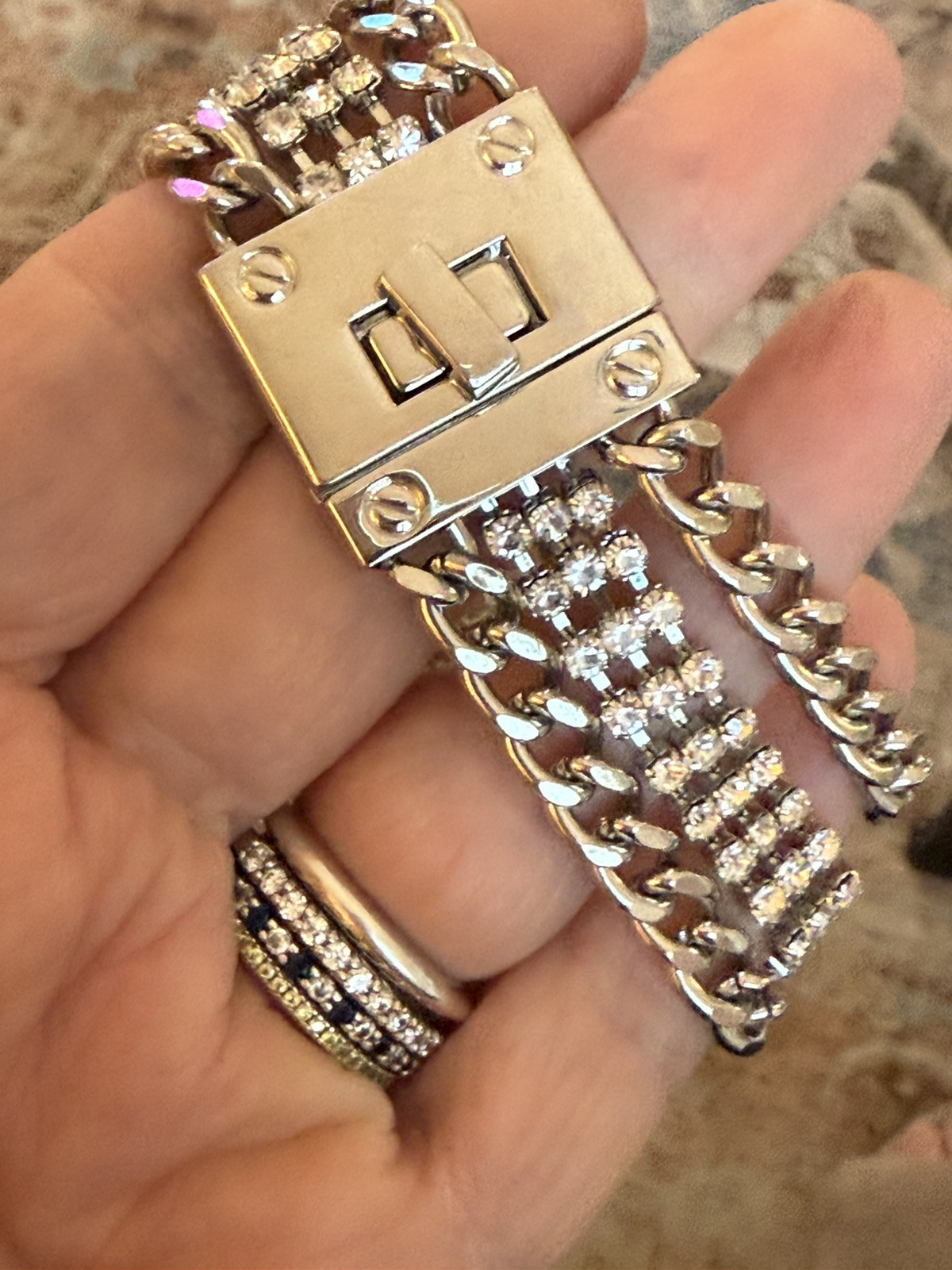 Silver Triple Link Turn Lock Chain Bracelet With Center Rhinestone Details