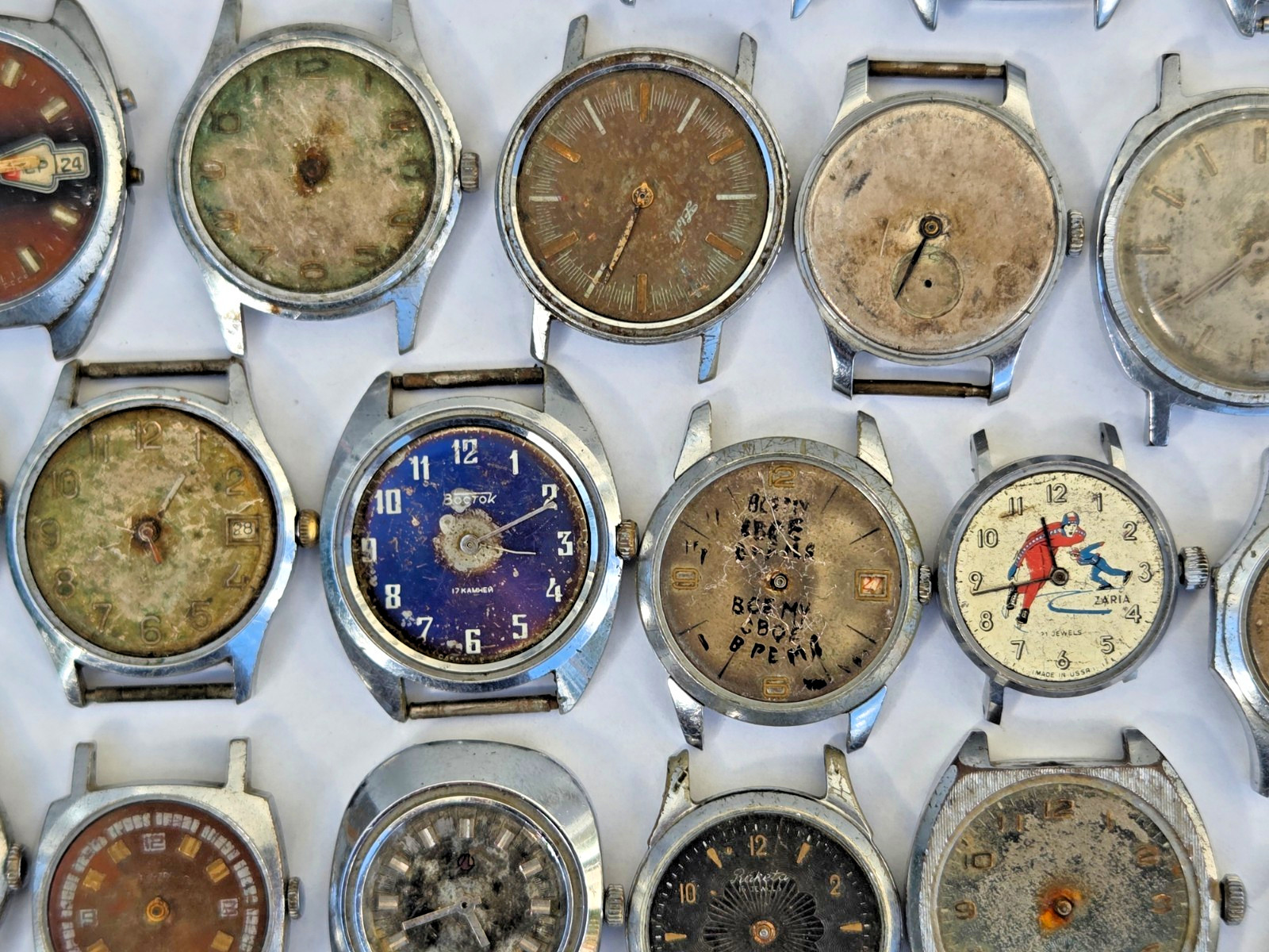 Lot of 75 Russian Watches Vostok Pobeda Mayak Zim etc Not working for parts Read