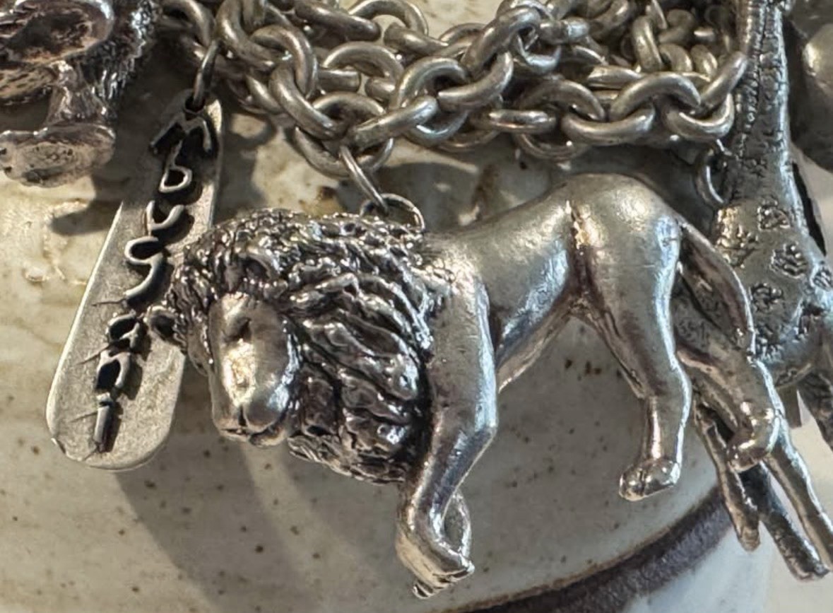Signed Susan Cummings statement sterling silver African animal charm bracelet