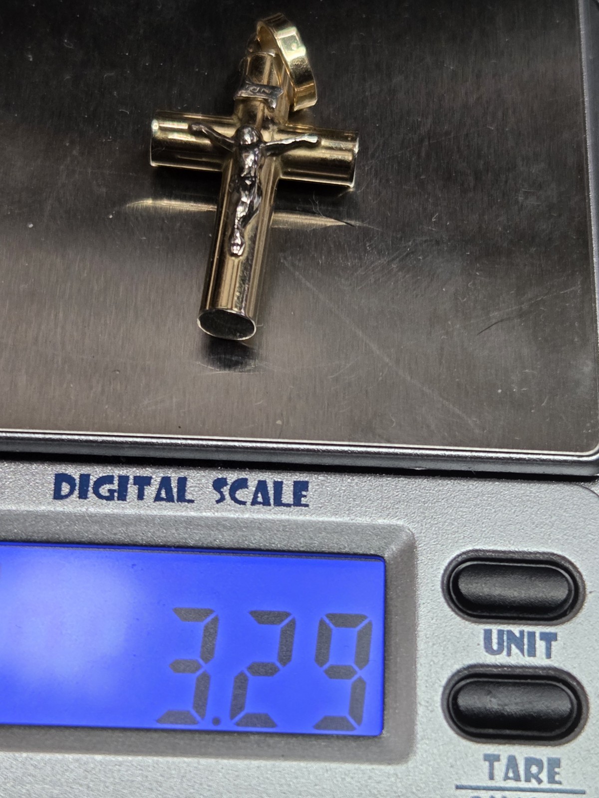 14 KT GOLD RELIGIOUS CROSS. 3.2 Grams