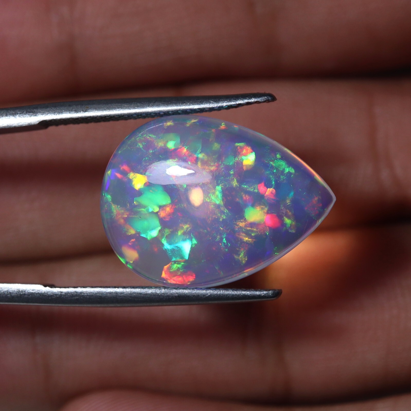 9 Carat 21.9×15.9 MM Natural AAAA Rainbow Fire Ethiopian Welo Opal Pear Shape