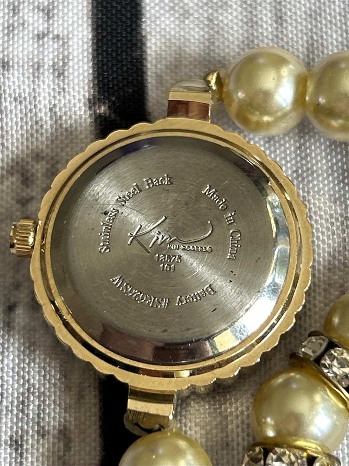 Kim Rogers Gold Tone Pearl Wrap Style Band Watch