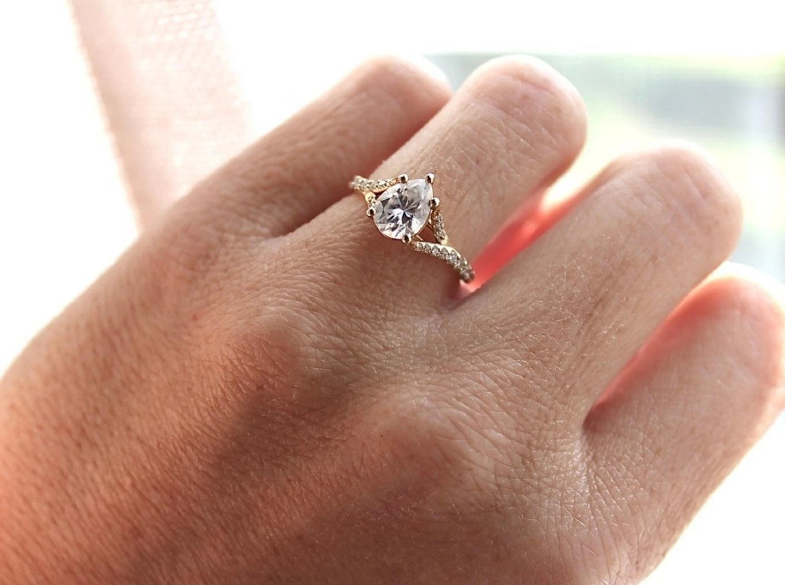 Sparkling 1.25CT Pear Cut White Moissanite With 10K Yellow Gold Ring For WomenFN