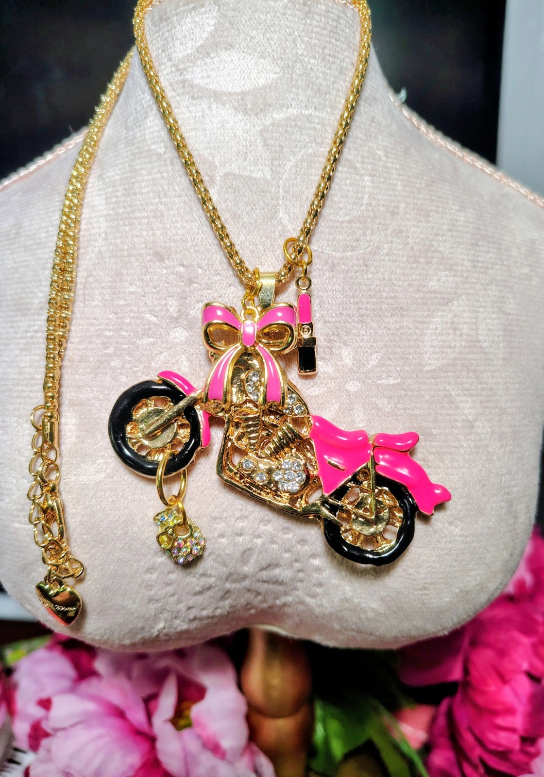 Betsey Johnson Pink Rhinestone motorcycle with BOW, SKULL, And LIPSTICK charms