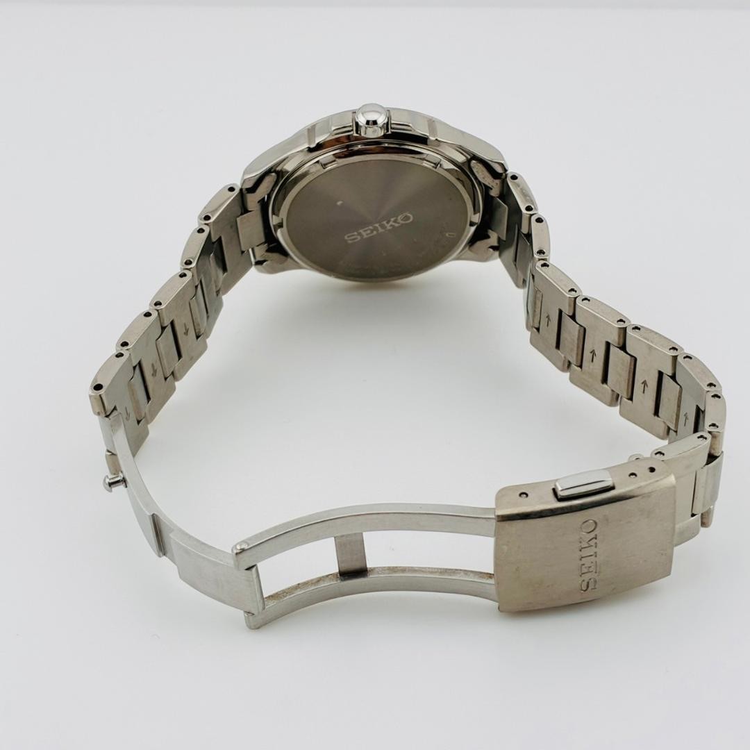SEIKO Men’s Watch, Date Display, Original Strap, Solar Powered, Titanium