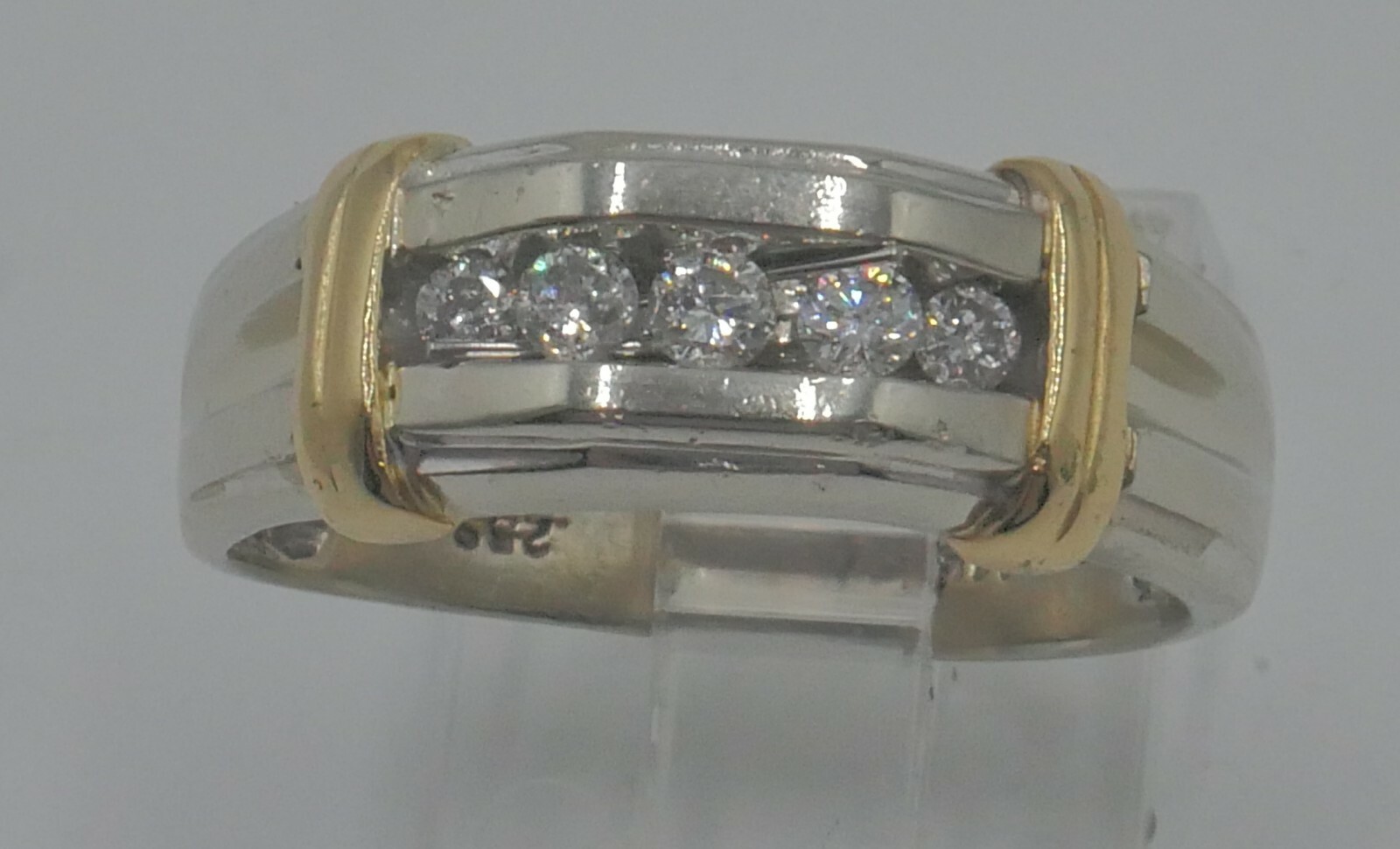 14kt two tone yellow & white gold ring 6.7 gram size 10.25 ; 5 diamonds 0.25 pts