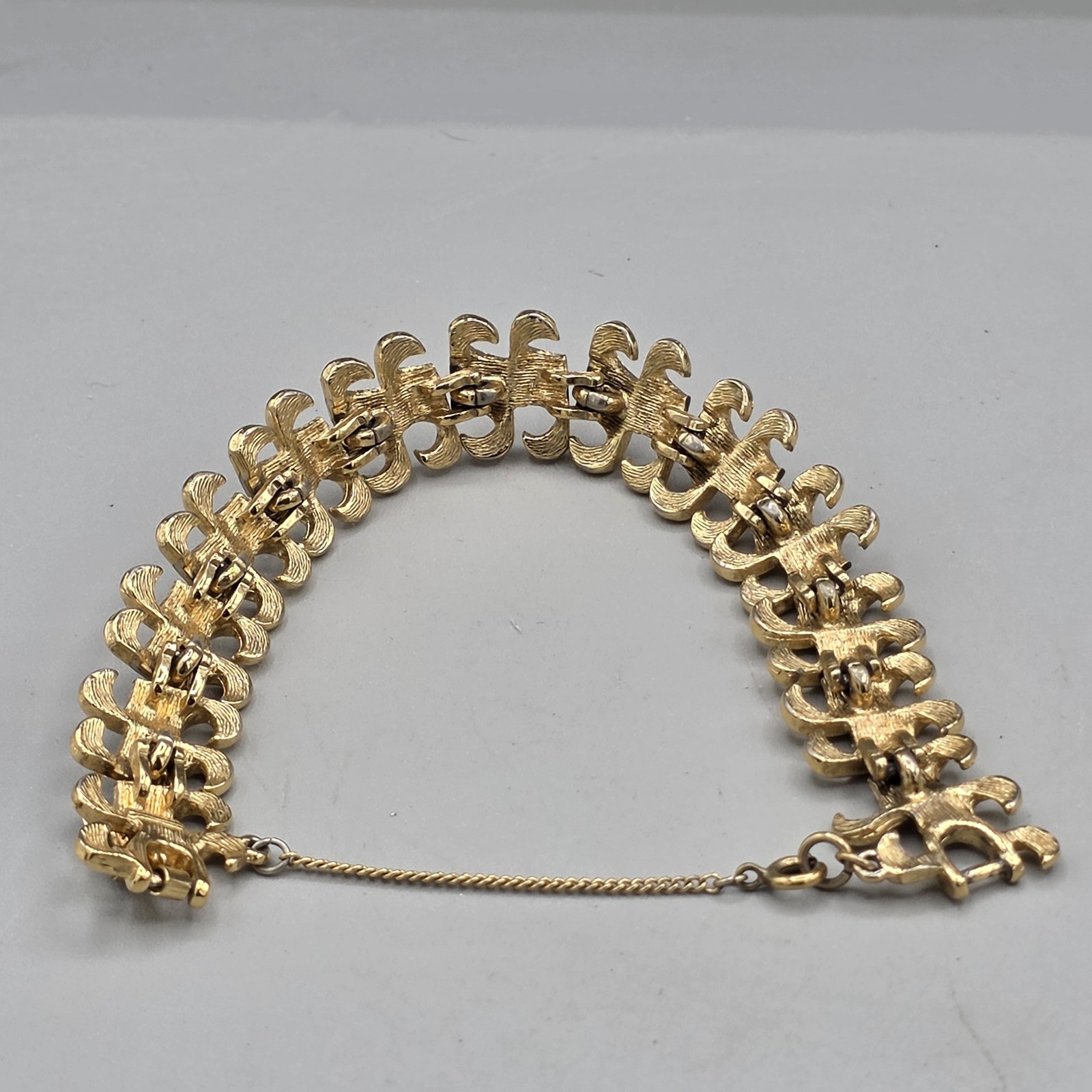 Vintage Monet Gold Tone Textured Link Panel Bracelet Fold Over Clasp