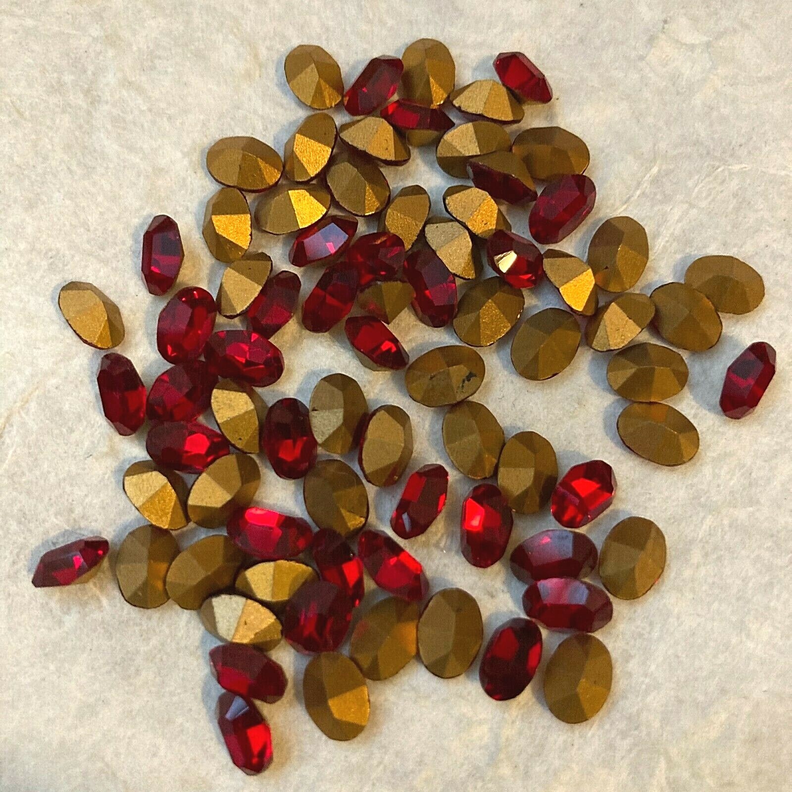AL275 Vintage glass stones 7x5mm ruby MC oval gold foil faceted front & back(72)