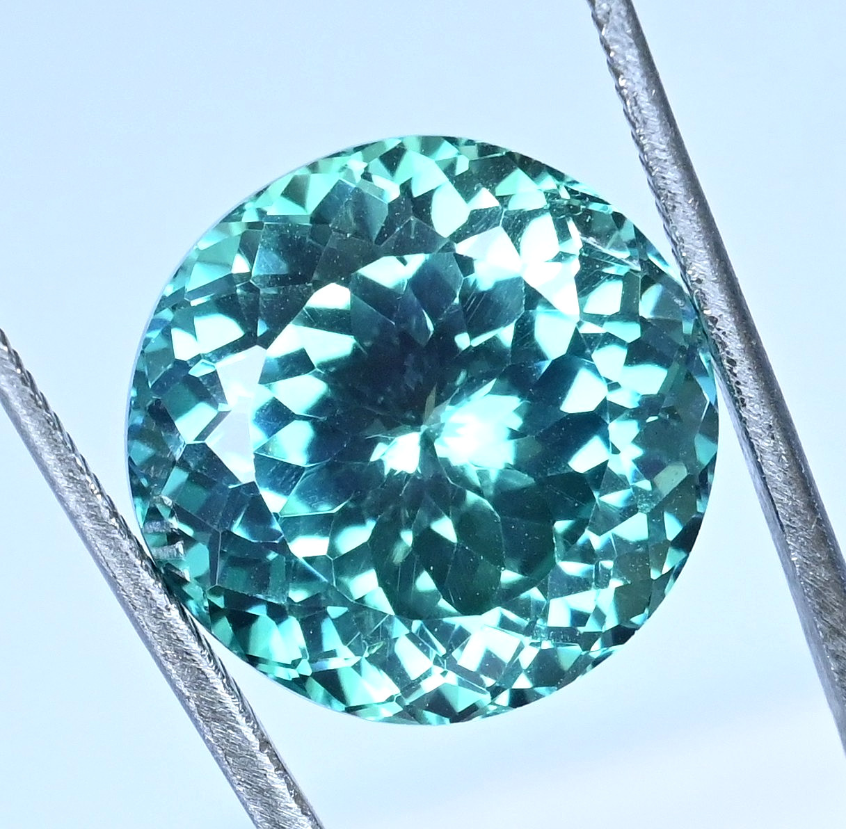 26.75 Ct Natural Green-Blue Serendibite Certified Flawless Round Loose Gemstone