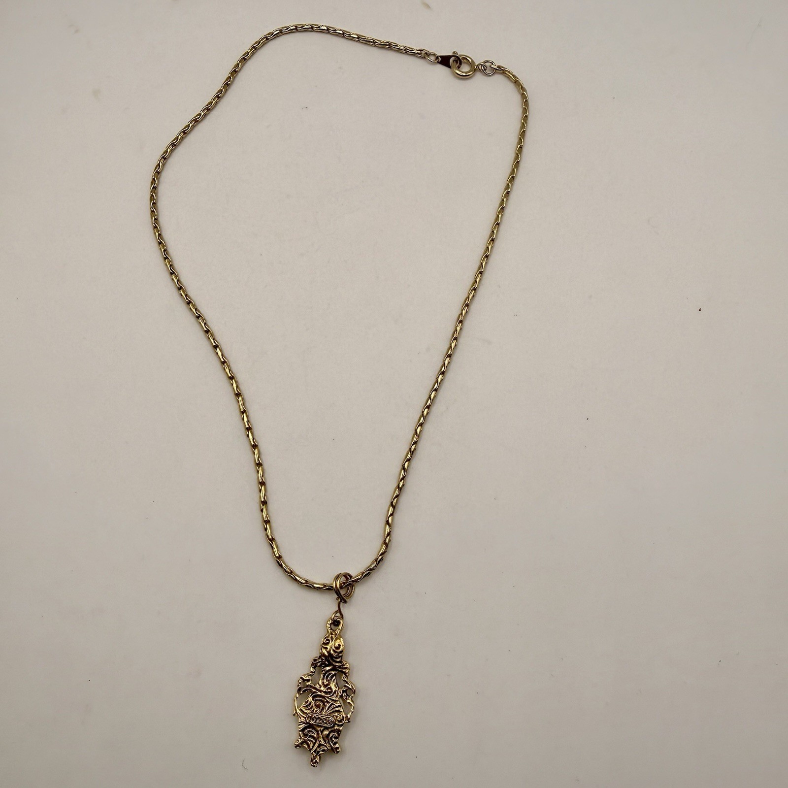 Vintage 1928 Gold Tone Rose Pendant Necklace Amethyst Purple Rhinestone