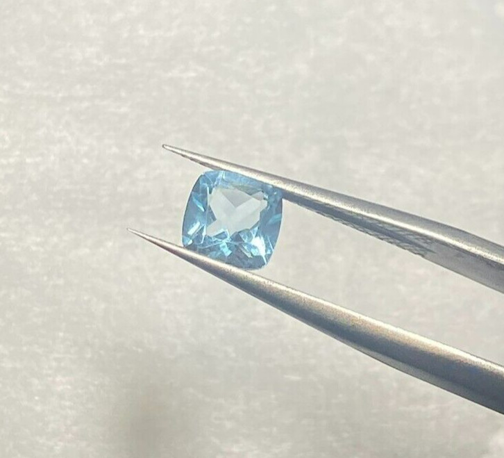 1.28 CTS APPROX CUSHION CUT 6 X 6 MM BABY BLUE BRAZILIAN TOPAZ, VVS/VS $14 EACH