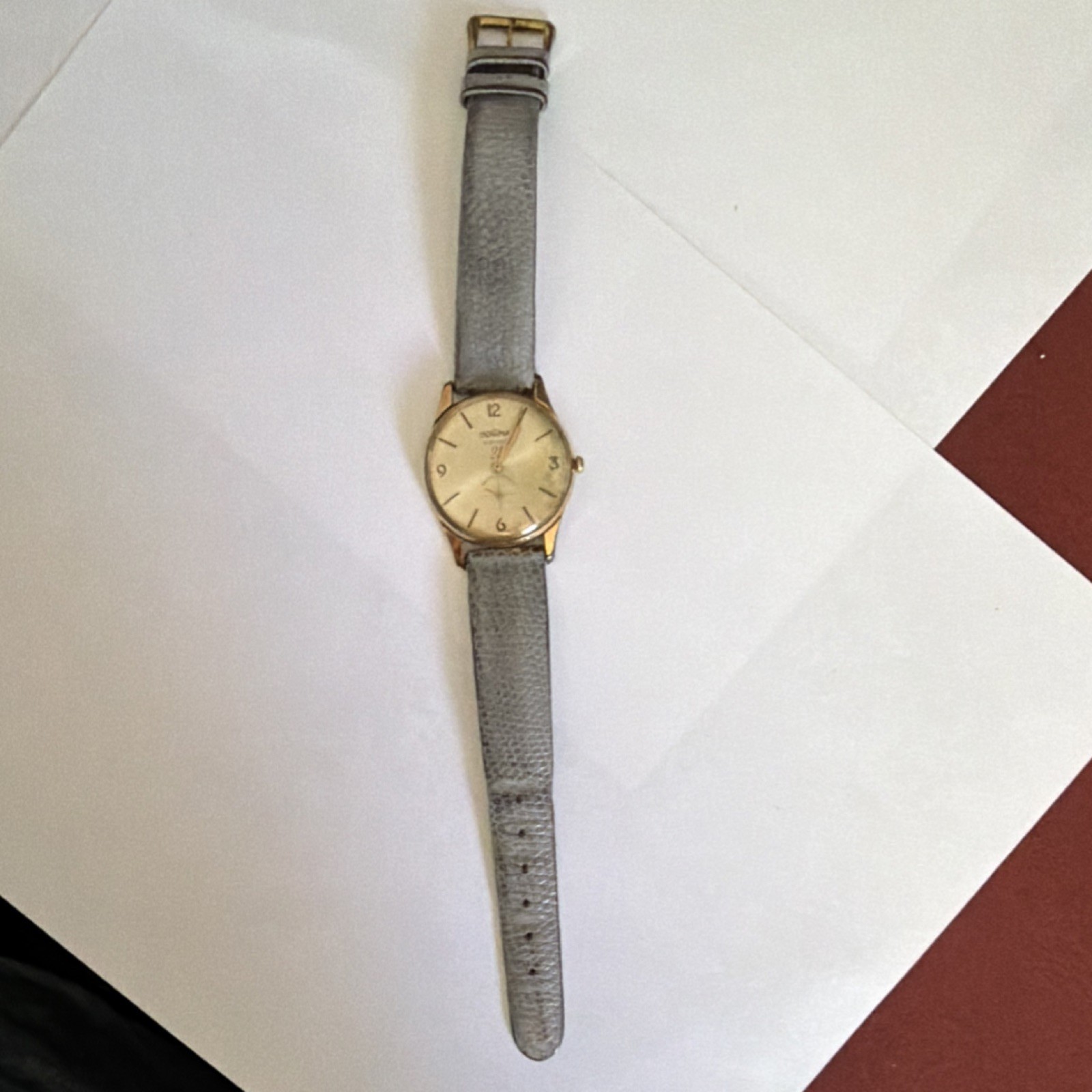Dogma Prima Swiss Made 21 Jewel Manual Wind Gold Tone Watch Gray Leather Strap
