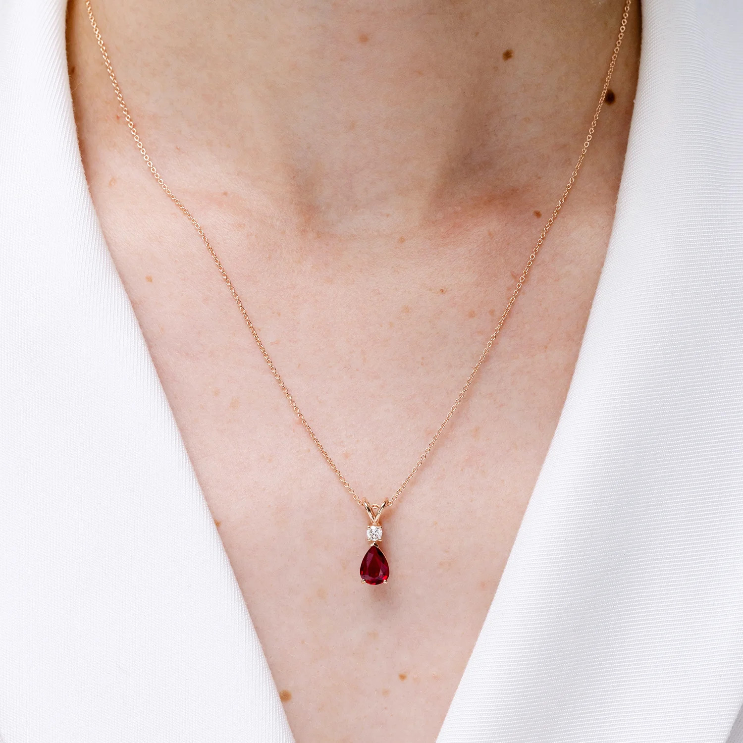 Angara Natural Prong-Set Ruby Teardrop V-Bale Pendant with Diamond in Silver