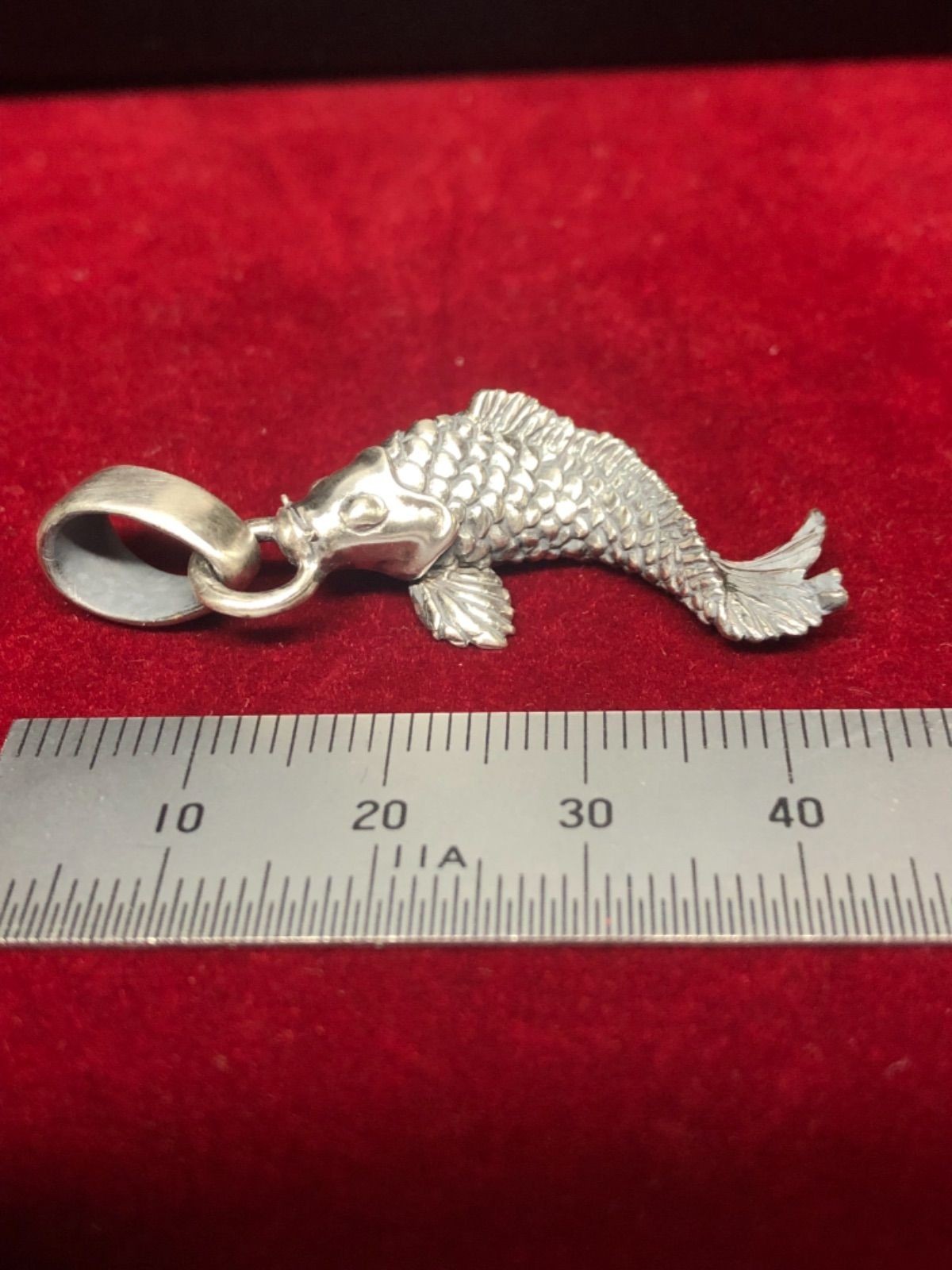 Ascending koi pendant top