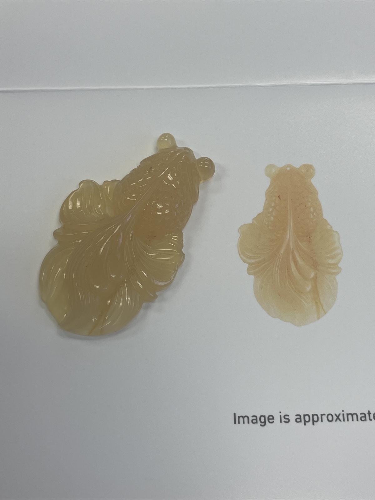 GIA Certified Pierced Carving Semi Transparent Orange Yellow Chalcedony Fish