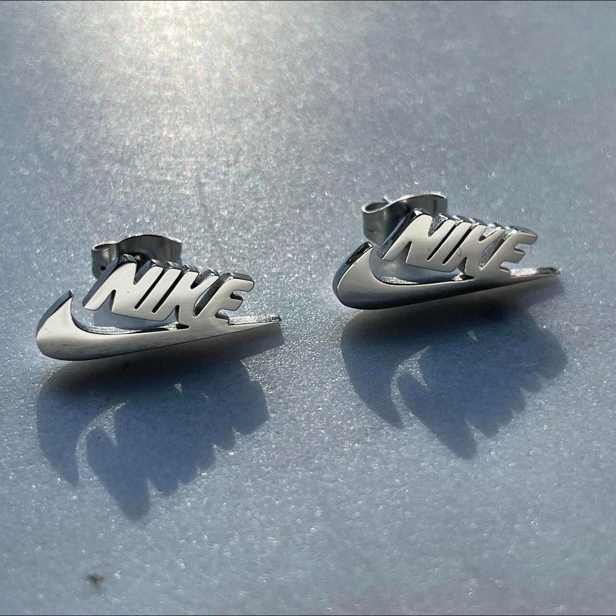 Nike Swoosh Silver Stainless Steel Earrings — Butterfly Back