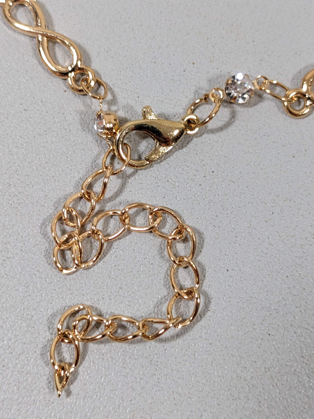 Gold Tone Infinity Clear Crystal Tennis Bracelet 10 inches