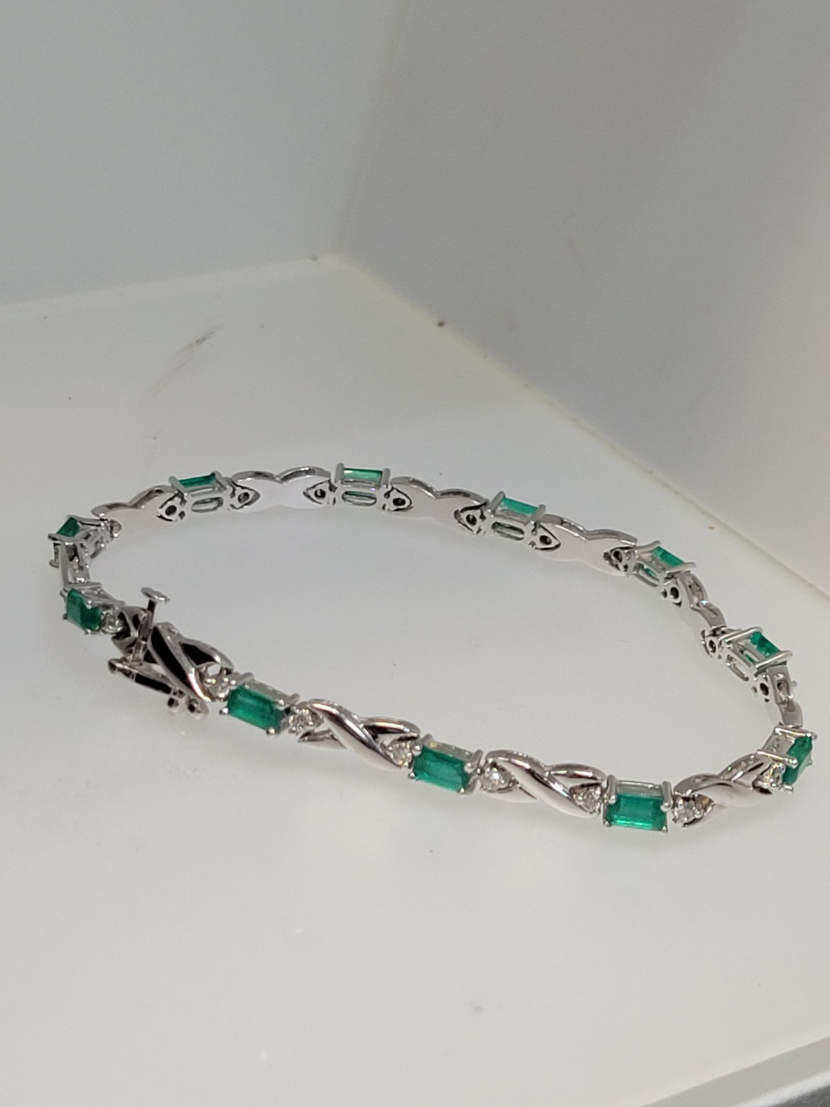 18k White Gold 3.3 cttw Gorgeous Emeralds and .63 cttw Diamond Bracelet