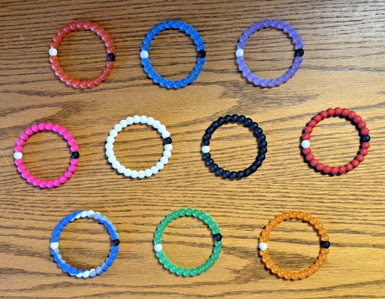 LOT OF TEN (10) LOKAI Silicone Bracelets Assortment of Colors and Sizes