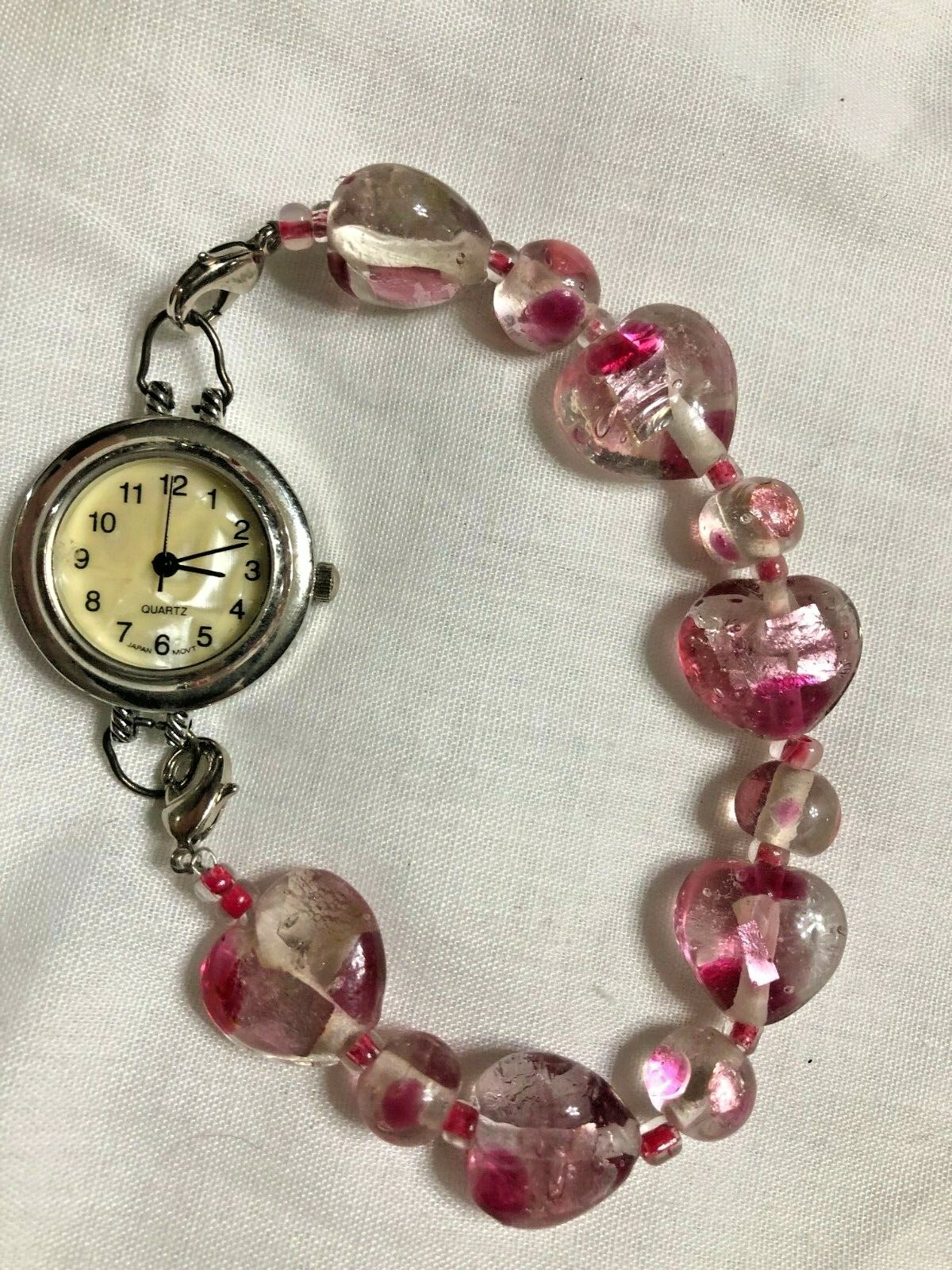 Watch w rose pink glass acrylic bracelet band approx 6 inches