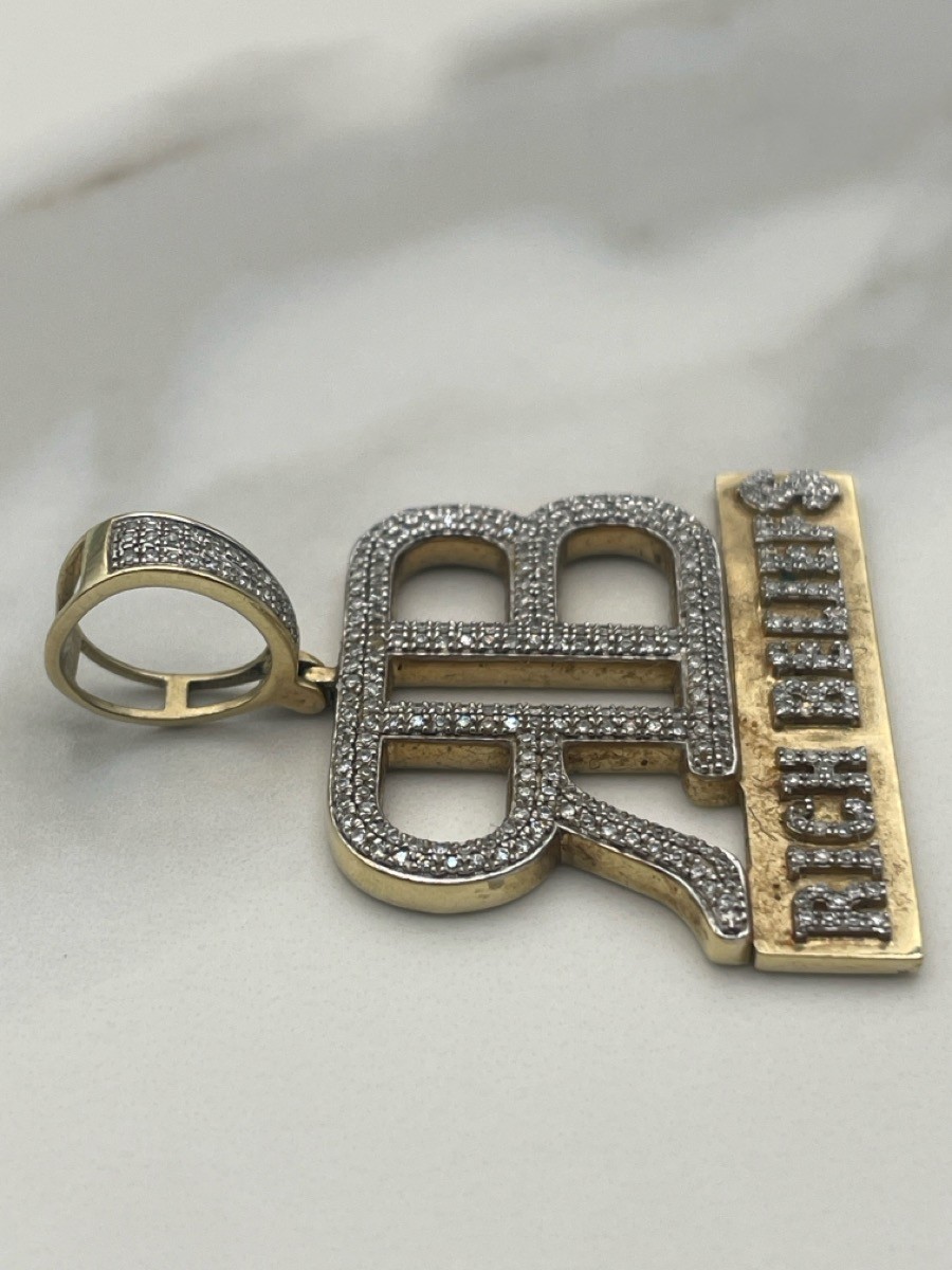 10K Diamond Studded “Rich Beliefs” Pendant Yellow Gold 6.9g (TDW045440)