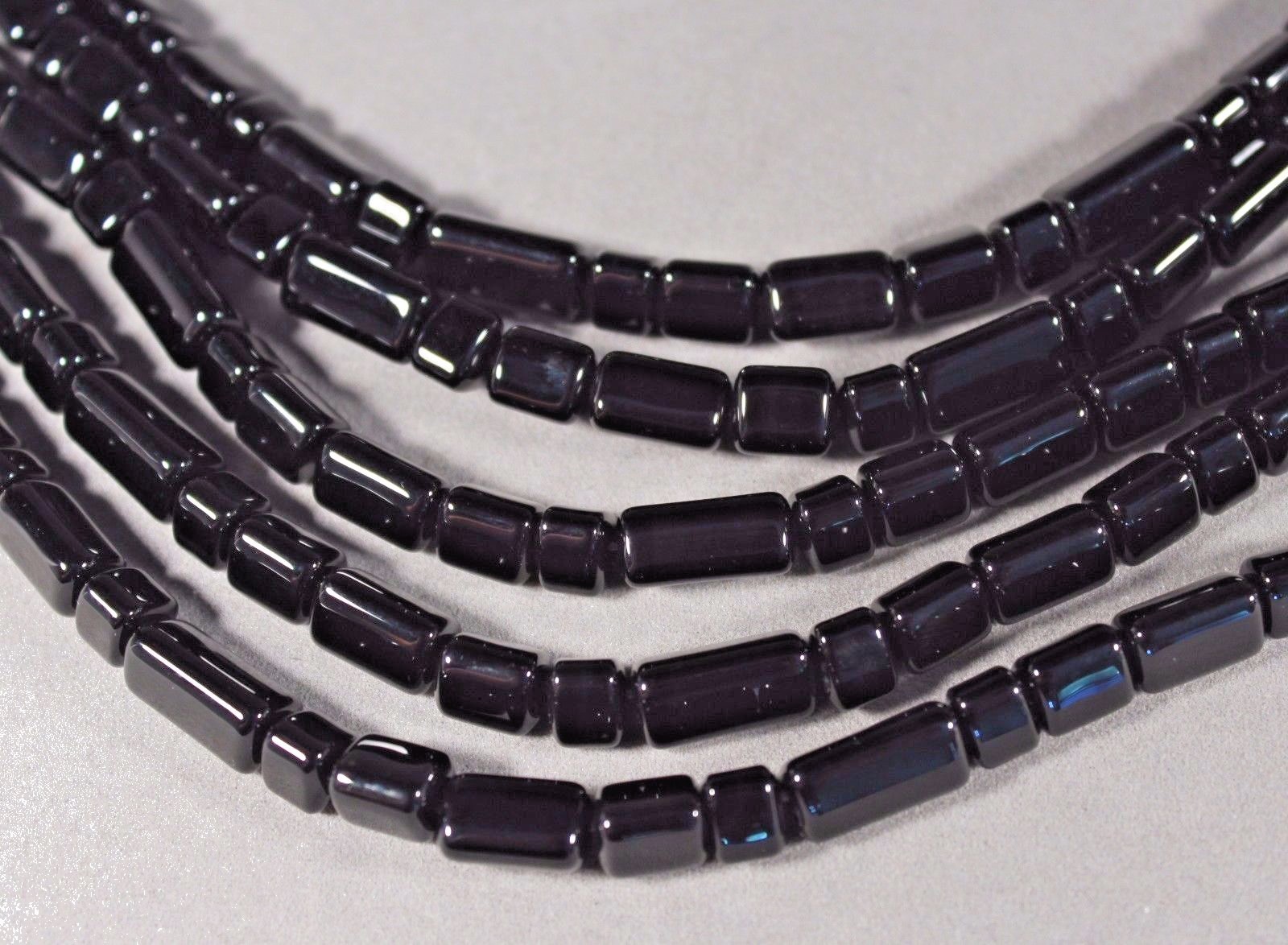 TRIANGLE BLACK ONYX 5-13MM THREE SIDED TUBE / RONDELLE BEADS 16″ STRAND