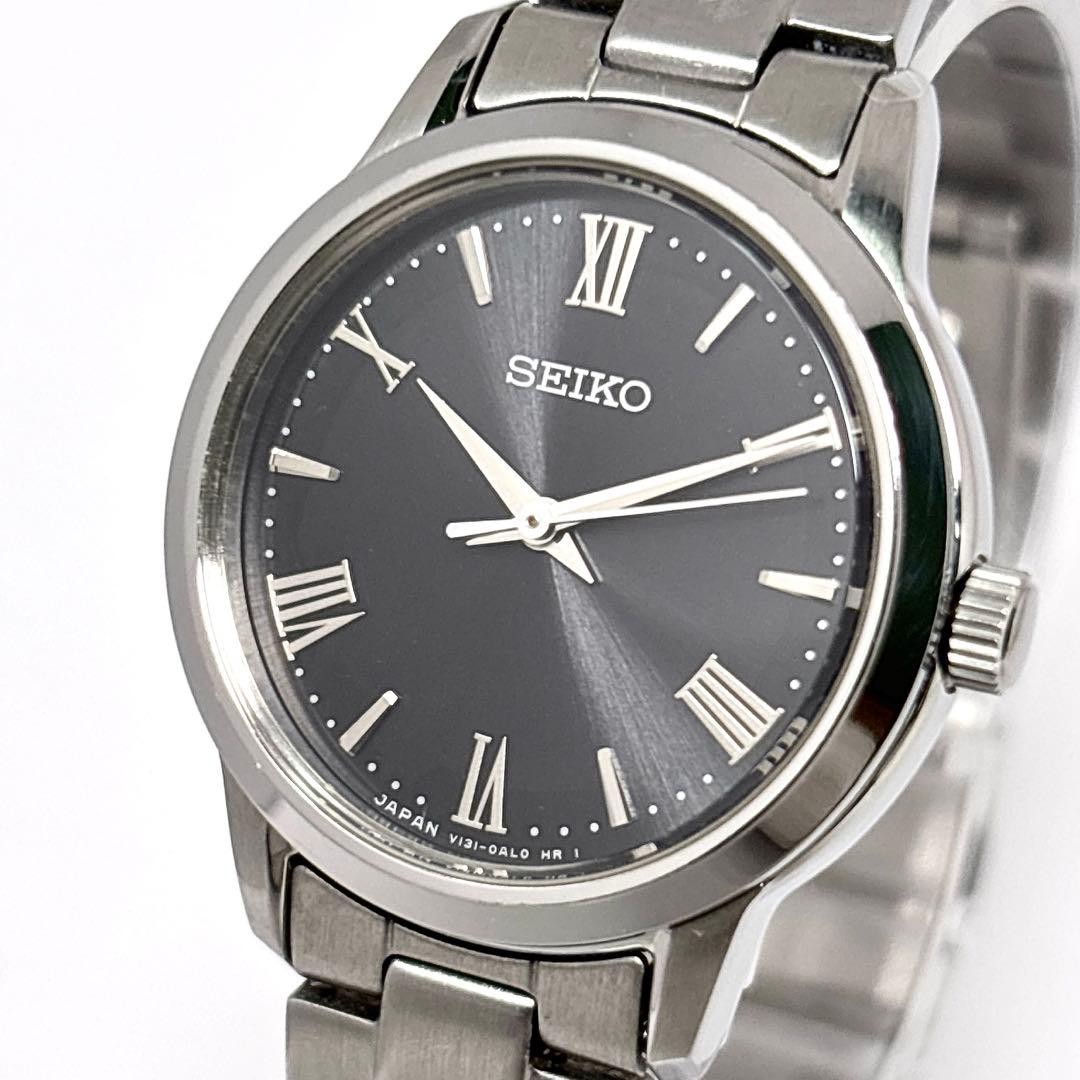 SEIKO V131-0AF0 Solar Ladies Watch Quartz Round Roman Black Dial Stainless Steel