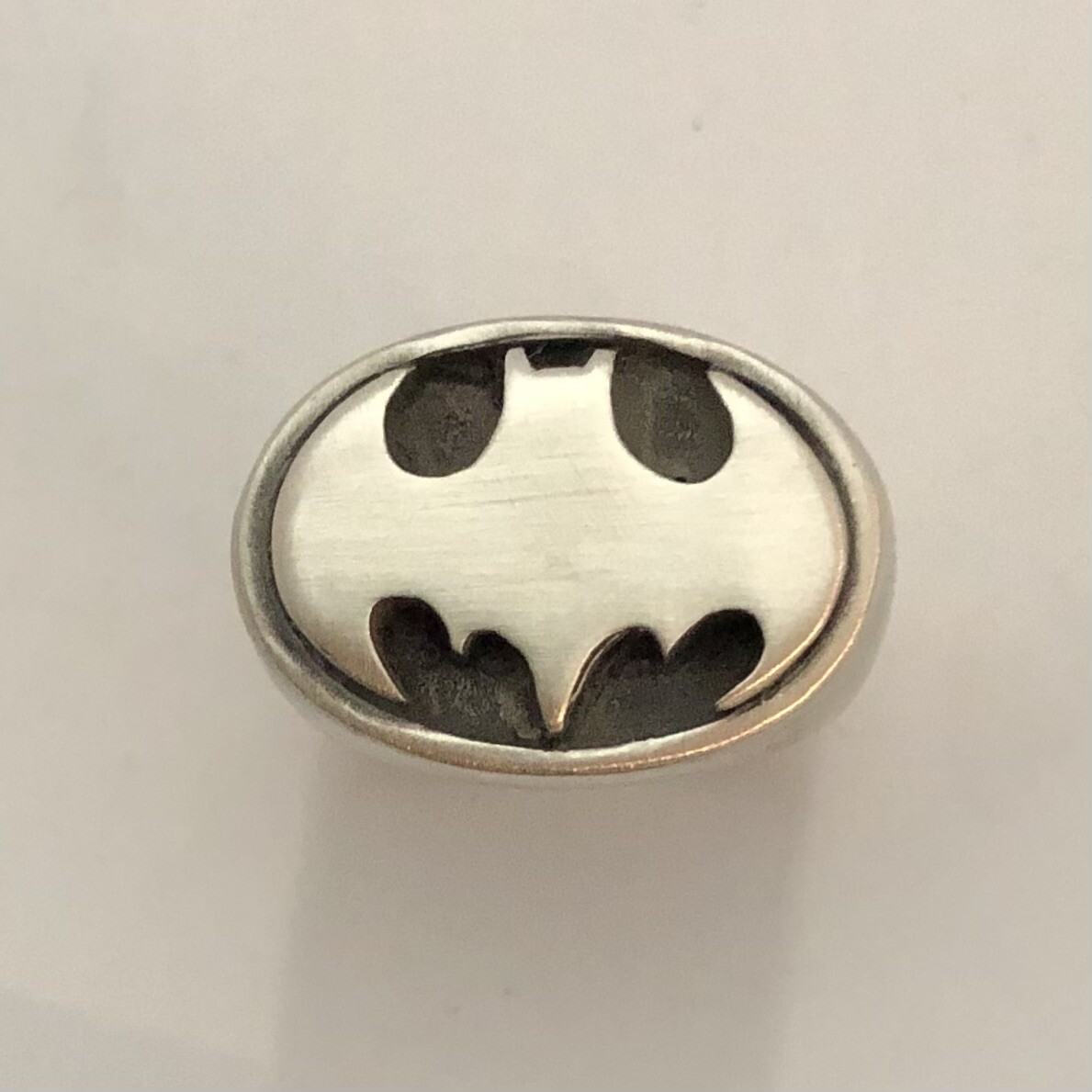 MJG STERLING SILVER OVAL BATMAN RING. STARTS AT SIZE 10
