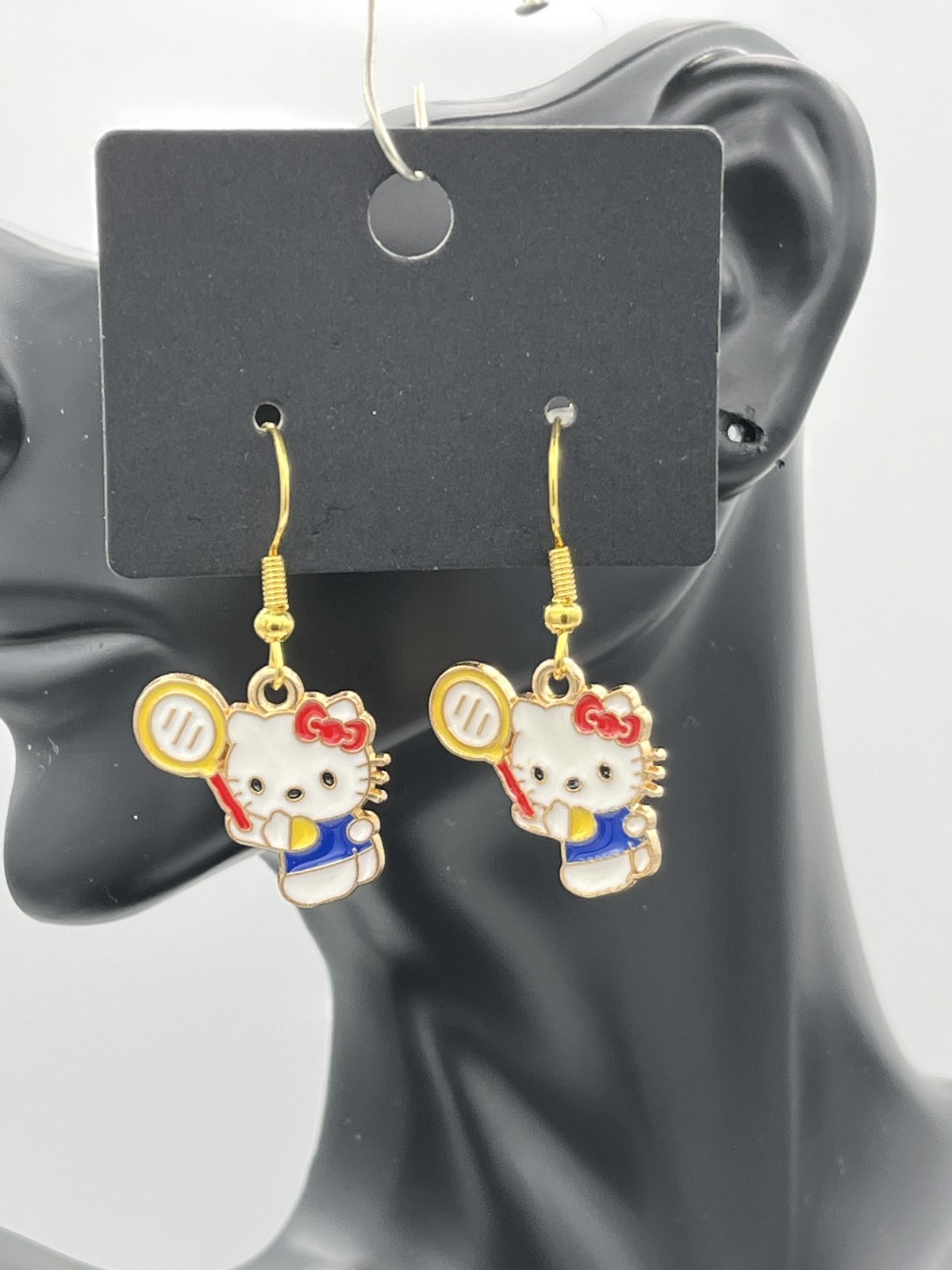 Hello Kitty, playing tennis multicolored earrings, costume jewelry