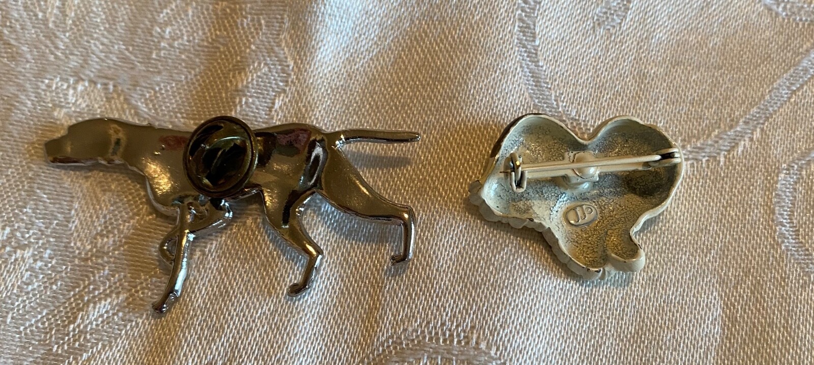 Vintage dog pins, 2 pins,one silver tone unsigned, one JJ enameled sheepdog